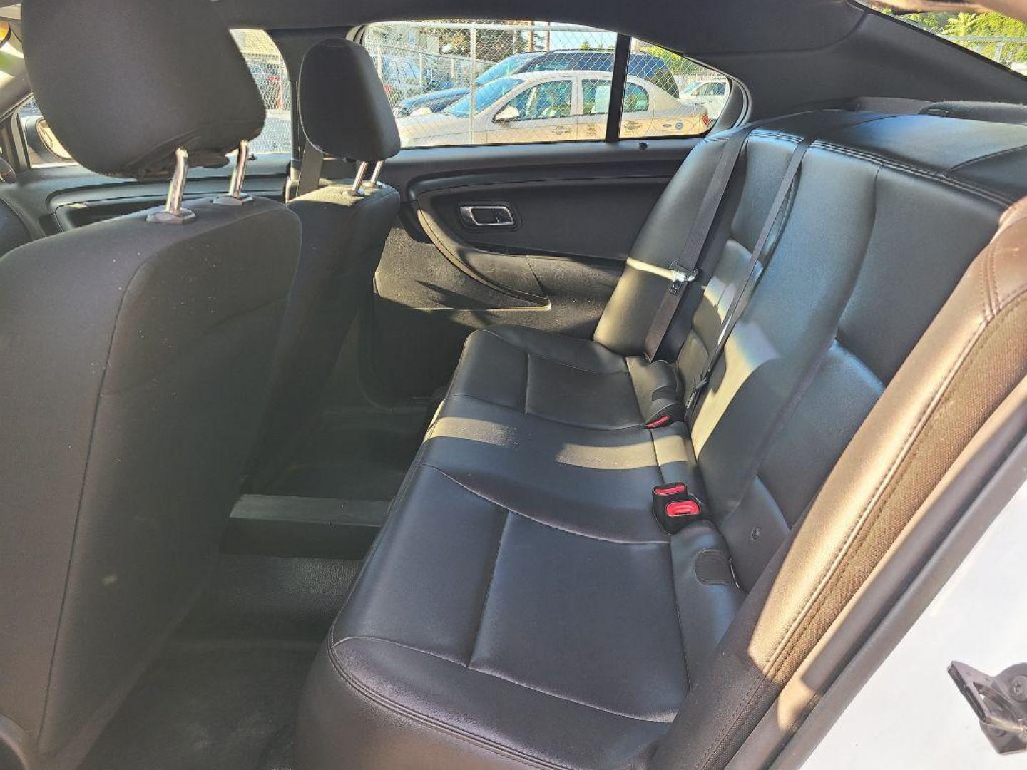 2014 WHITE FORD TAURUS POLICE INTERCEPTOR (1FAHP2MK5EG) with an 3.7L engine, Automatic transmission, located at 117 North Cameron Street, Harrisburg, PA, 17101, (717) 963-8962, 40.266762, -76.875259 - WE FINANCE!!! Good Credit/ Bad Credit/ No Credit - ALL Trade-Ins Welcomed!!! ***Guaranteed Credit Approval*** APPLY ONLINE or CALL us TODAY ;) Please call us to discuss your cash and financing options. - Photo#14