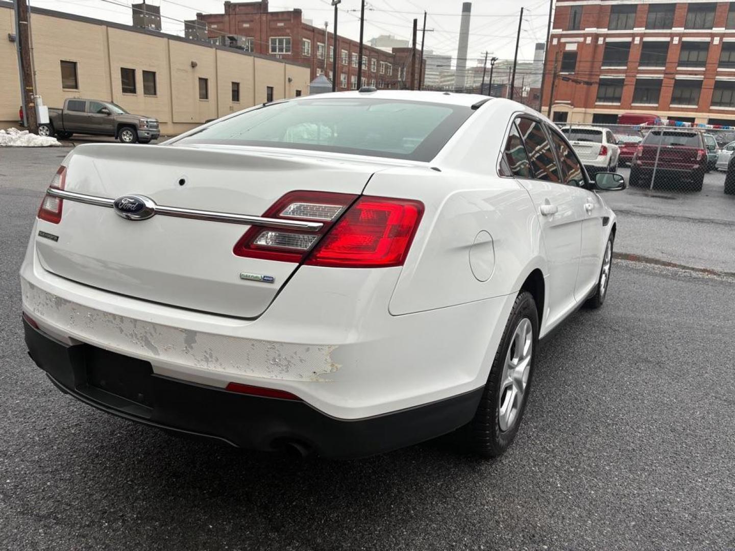 2014 WHITE FORD TAURUS POLICE INTERCEPTOR (1FAHP2MK7EG) with an 3.7L engine, Automatic transmission, located at 117 North Cameron Street, Harrisburg, PA, 17101, (717) 963-8962, 40.266762, -76.875259 - WE FINANCE!!! Good Credit/ Challenged Credit/ No Credit - ALL Trade-Ins Welcomed!!! APPLY ONLINE or CALL us TODAY ;) Please call us to discuss your cash and/or financing options. - Photo#4