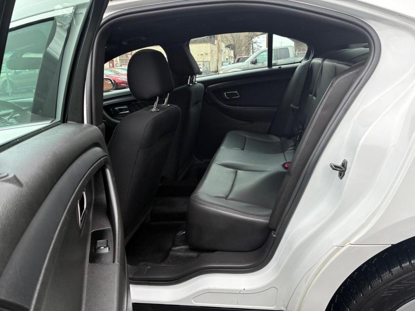 2014 WHITE FORD TAURUS POLICE INTERCEPTOR (1FAHP2MK7EG) with an 3.7L engine, Automatic transmission, located at 117 North Cameron Street, Harrisburg, PA, 17101, (717) 963-8962, 40.266762, -76.875259 - WE FINANCE!!! Good Credit/ Challenged Credit/ No Credit - ALL Trade-Ins Welcomed!!! APPLY ONLINE or CALL us TODAY ;) Please call us to discuss your cash and/or financing options. - Photo#11