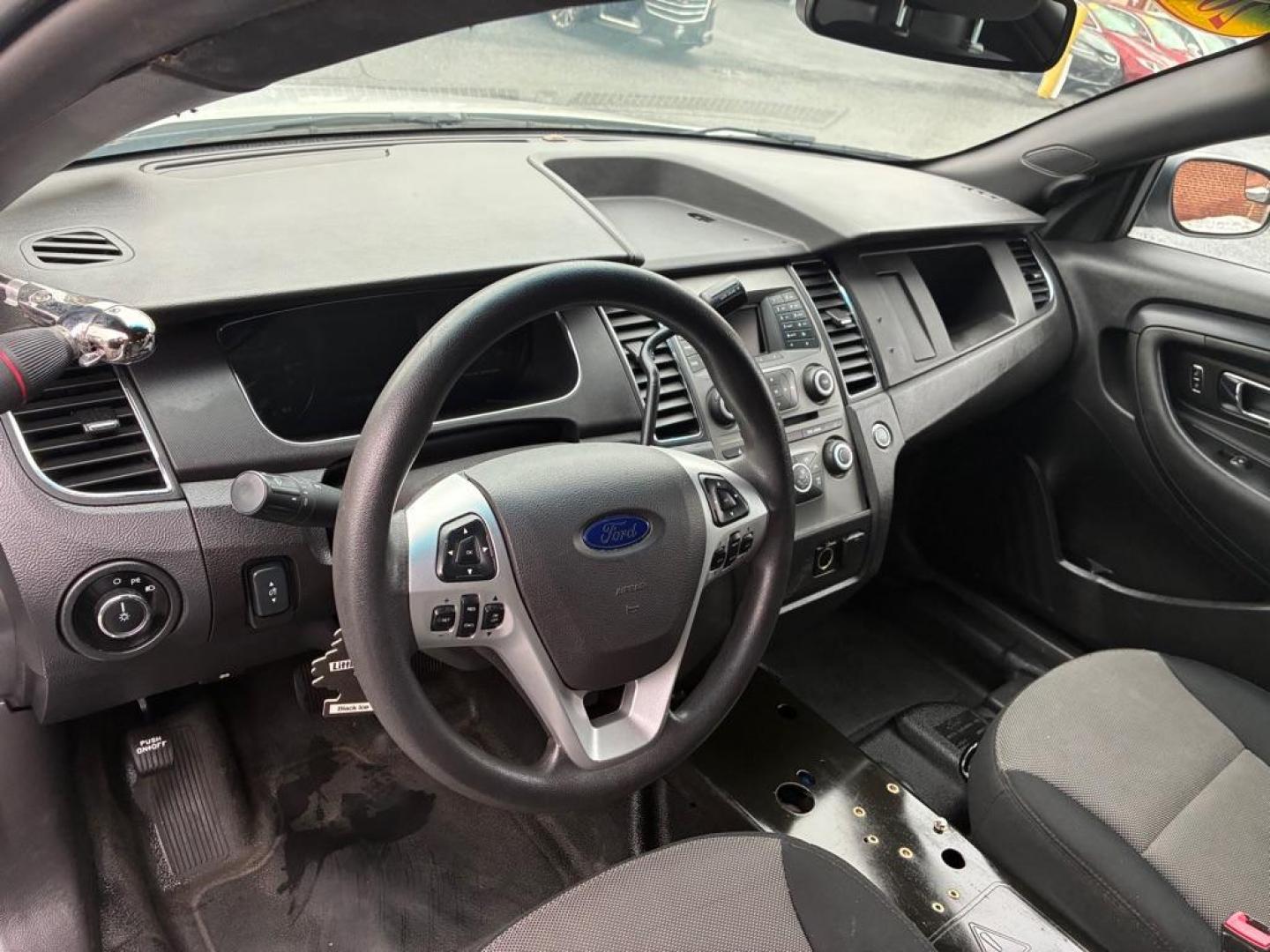 2014 WHITE FORD TAURUS POLICE INTERCEPTOR (1FAHP2MK7EG) with an 3.7L engine, Automatic transmission, located at 117 North Cameron Street, Harrisburg, PA, 17101, (717) 963-8962, 40.266762, -76.875259 - WE FINANCE!!! Good Credit/ Challenged Credit/ No Credit - ALL Trade-Ins Welcomed!!! APPLY ONLINE or CALL us TODAY ;) Please call us to discuss your cash and/or financing options. - Photo#14