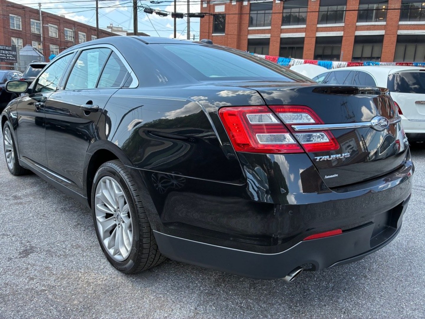 2014 BLACK FORD TAURUS LIMITED (1FAHP2J80EG) with an 3.5L engine, Automatic transmission, located at 117 North Cameron Street, Harrisburg, PA, 17101, (717) 963-8962, 40.266762, -76.875259 - WE FINANCE!!! MOST vehicles are available for financing. Good Credit/ Challenged Credit/ No Credit - ALL Trade-Ins Welcomed!!! APPLY ONLINE or CALL us TODAY Please call us to discuss your cash and/or financing options. Thanks for checking our inventory! We're here to help.- Photo#2