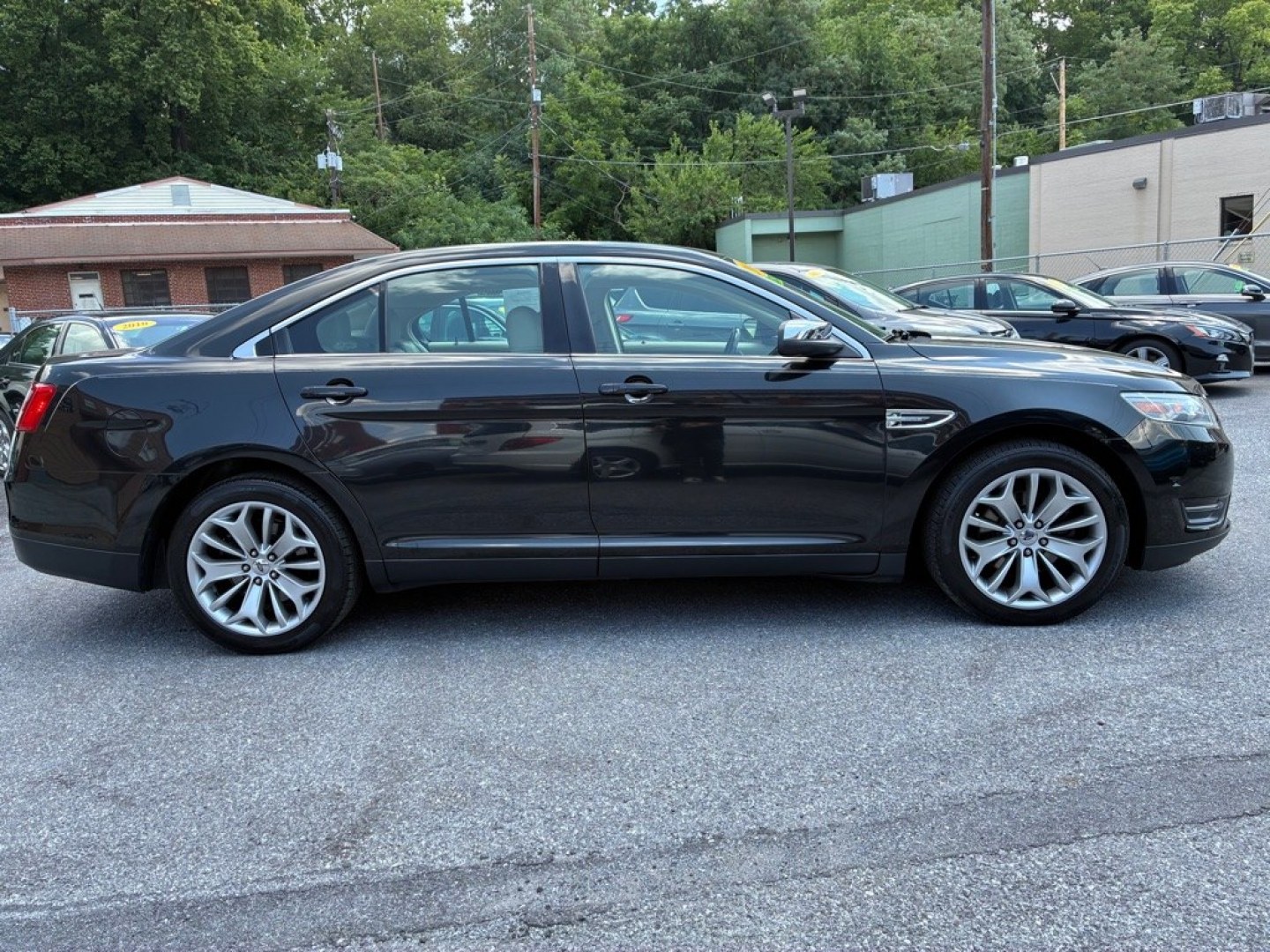 2014 BLACK FORD TAURUS LIMITED (1FAHP2J80EG) with an 3.5L engine, Automatic transmission, located at 117 North Cameron Street, Harrisburg, PA, 17101, (717) 963-8962, 40.266762, -76.875259 - WE FINANCE!!! MOST vehicles are available for financing. Good Credit/ Challenged Credit/ No Credit - ALL Trade-Ins Welcomed!!! APPLY ONLINE or CALL us TODAY Please call us to discuss your cash and/or financing options. Thanks for checking our inventory! We're here to help.- Photo#5