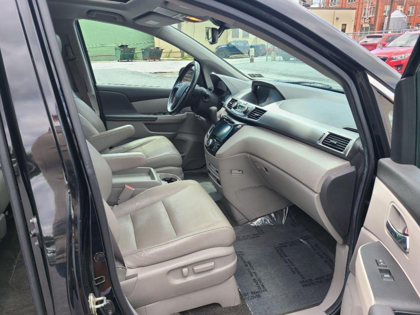 2014 BLACK HONDA ODYSSEY EXL (5FNRL5H65EB) with an 3.5L engine, Automatic transmission, located at 117 North Cameron Street, Harrisburg, PA, 17101, (717) 963-8962, 40.266762, -76.875259 - WE FINANCE!!! Good Credit/ Bad Credit/ No Credit - ALL Trade-Ins Welcomed!!! ***Guaranteed Credit Approval*** APPLY ONLINE or CALL us TODAY ;) Internet Prices and Marketplace Prices are SPECIAL discounted ***CASH DEALS*** Retail Prices are higher. Please call us to discuss your cash and finan - Photo#16