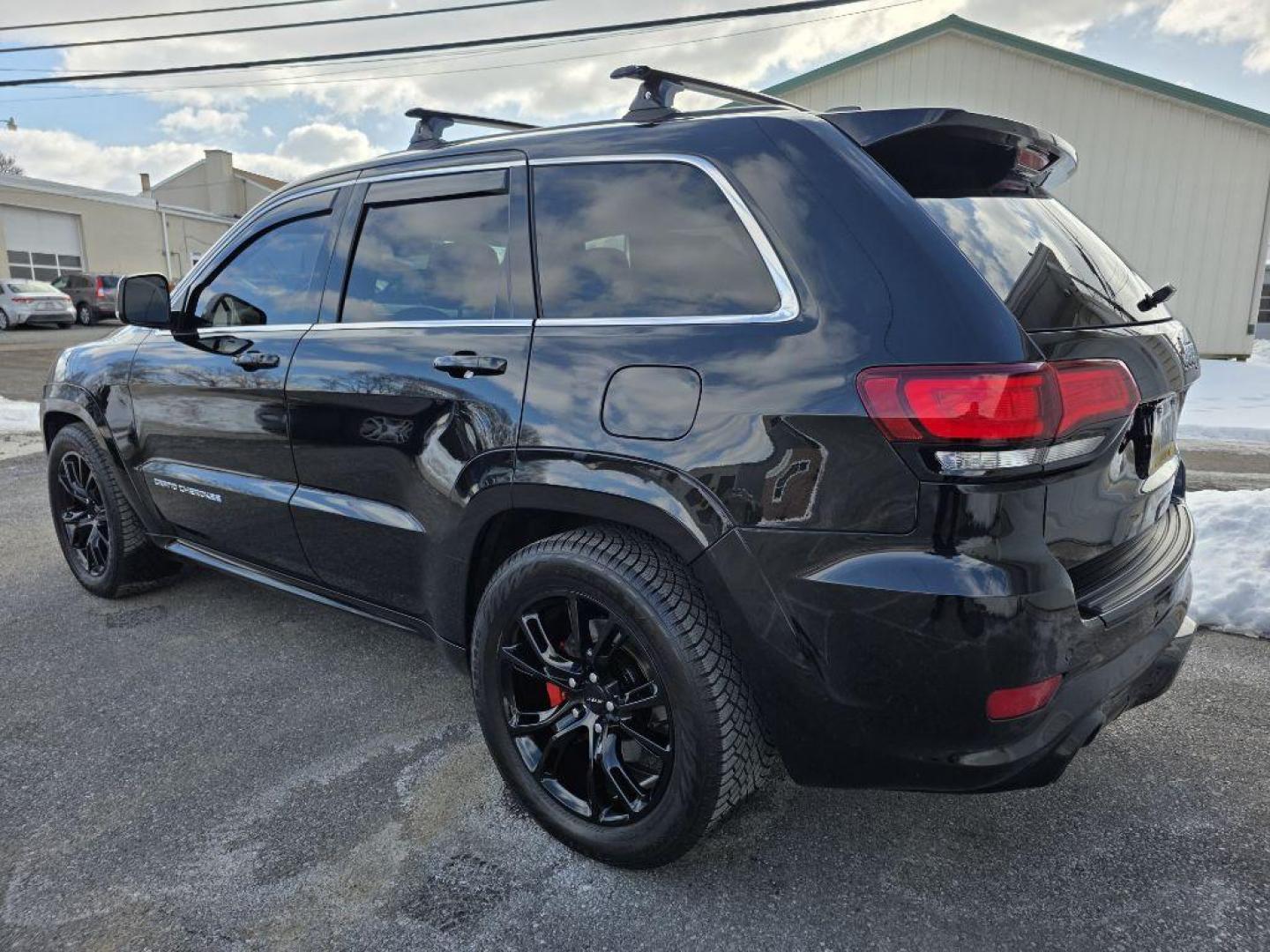 2014 BLACK JEEP GRAND CHEROKEE SRT-8 (1C4RJFDJ4EC) with an 6.4L engine, Automatic transmission, located at 7981 Paxton Street, Harrisburg, PA, 17111, (717) 561-2926, 40.261490, -76.749229 - WE FINANCE!!! Good Credit/ Challenged Credit/ No Credit - ALL Trade-Ins Welcomed!!! APPLY ONLINE or CALL us TODAY ;) Please call us to discuss your cash and/or financing options. - Photo#1