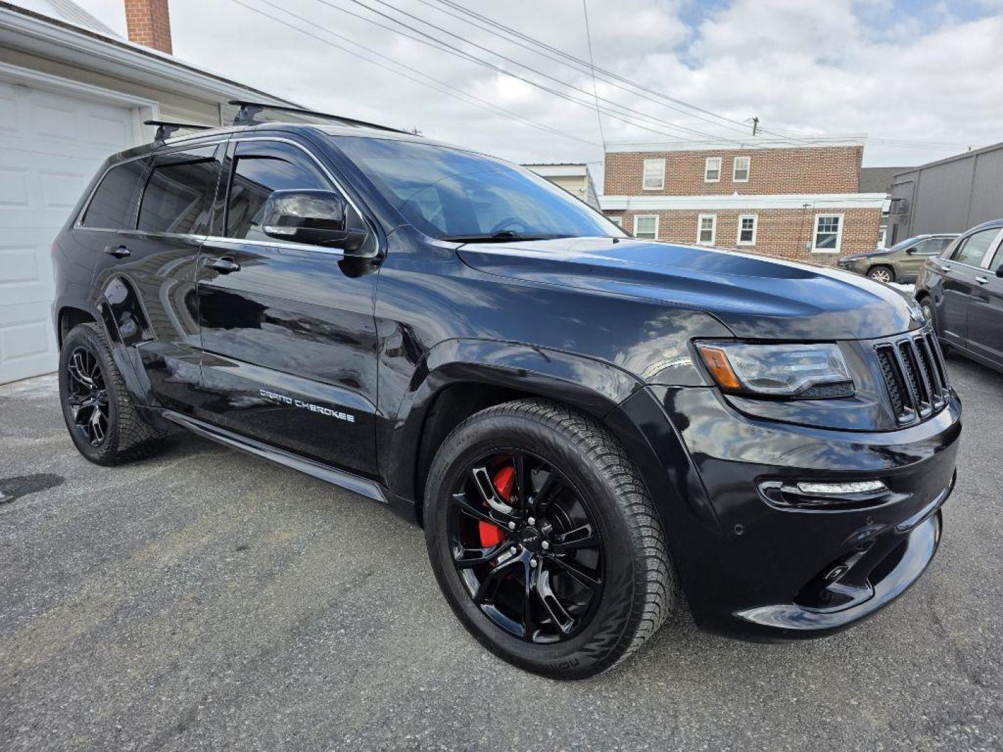 2014 BLACK JEEP GRAND CHEROKEE SRT-8 (1C4RJFDJ4EC) with an 6.4L engine, Automatic transmission, located at 7981 Paxton Street, Harrisburg, PA, 17111, (717) 561-2926, 40.261490, -76.749229 - WE FINANCE!!! Good Credit/ Challenged Credit/ No Credit - ALL Trade-Ins Welcomed!!! APPLY ONLINE or CALL us TODAY ;) Please call us to discuss your cash and/or financing options. - Photo#6