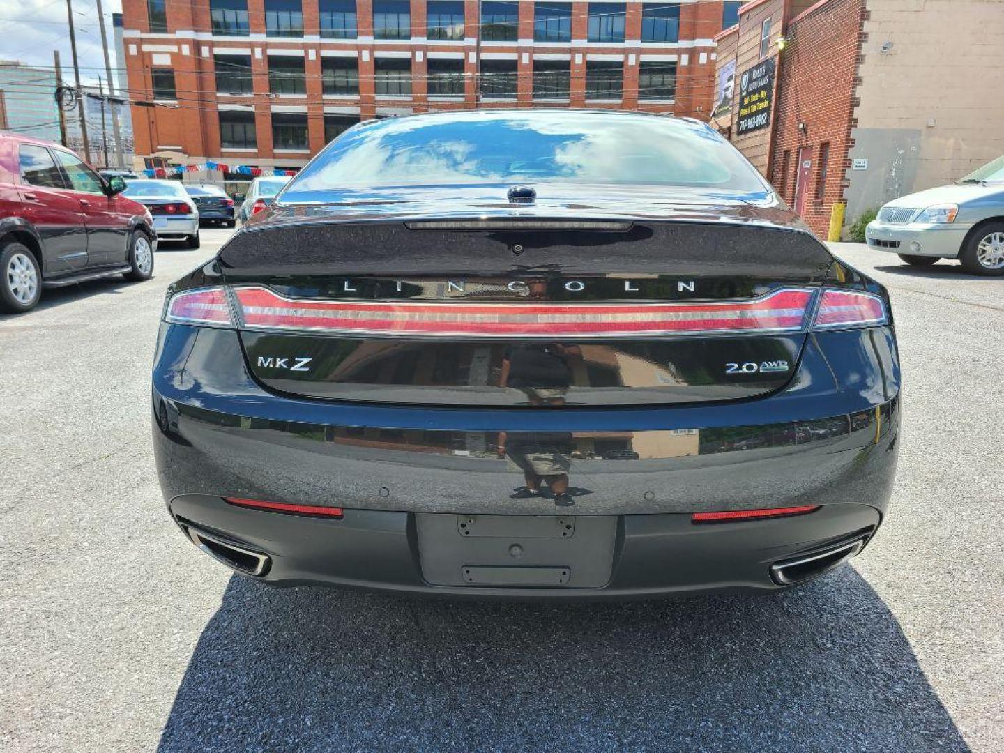 2014 BLACK LINCOLN MKZ SEDAN (3LN6L2J97ER) with an 2.0L engine, Automatic transmission, located at 7981 Paxton Street, Harrisburg, PA, 17111, (717) 561-2926, 40.261490, -76.749229 - WE FINANCE!!! Good Credit/ Bad Credit/ No Credit - ALL Trade-Ins Welcomed!!! ***Guaranteed Credit Approval*** APPLY ONLINE or CALL us TODAY ;) Internet Prices and Marketplace Prices are SPECIAL discounted ***CASH DEALS*** Retail Prices are higher. Please call us to discuss your cash and finan - Photo#3