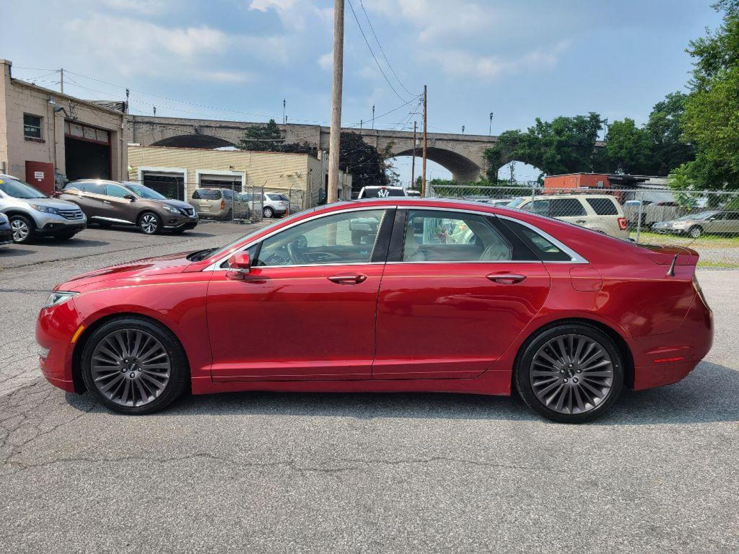 2014 RED LINCOLN MKZ AWD (3LN6L2J97ER) with an 2.0L engine, Automatic transmission, located at 117 North Cameron Street, Harrisburg, PA, 17101, (717) 963-8962, 40.266762, -76.875259 - WE FINANCE!!! Good Credit/ Bad Credit/ No Credit - ALL Trade-Ins Welcomed!!! ***Guaranteed Credit Approval*** APPLY ONLINE or CALL us TODAY ;) Internet Prices and Marketplace Prices are SPECIAL discounted ***CASH DEALS*** Retail Prices are higher. Please call us to discuss your cash and finan - Photo#2