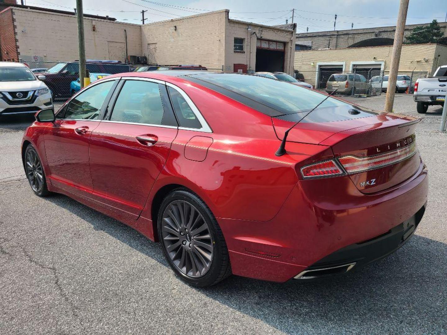 2014 RED LINCOLN MKZ AWD (3LN6L2J97ER) with an 2.0L engine, Automatic transmission, located at 117 North Cameron Street, Harrisburg, PA, 17101, (717) 963-8962, 40.266762, -76.875259 - WE FINANCE!!! Good Credit/ Bad Credit/ No Credit - ALL Trade-Ins Welcomed!!! ***Guaranteed Credit Approval*** APPLY ONLINE or CALL us TODAY ;) Internet Prices and Marketplace Prices are SPECIAL discounted ***CASH DEALS*** Retail Prices are higher. Please call us to discuss your cash and finan - Photo#3