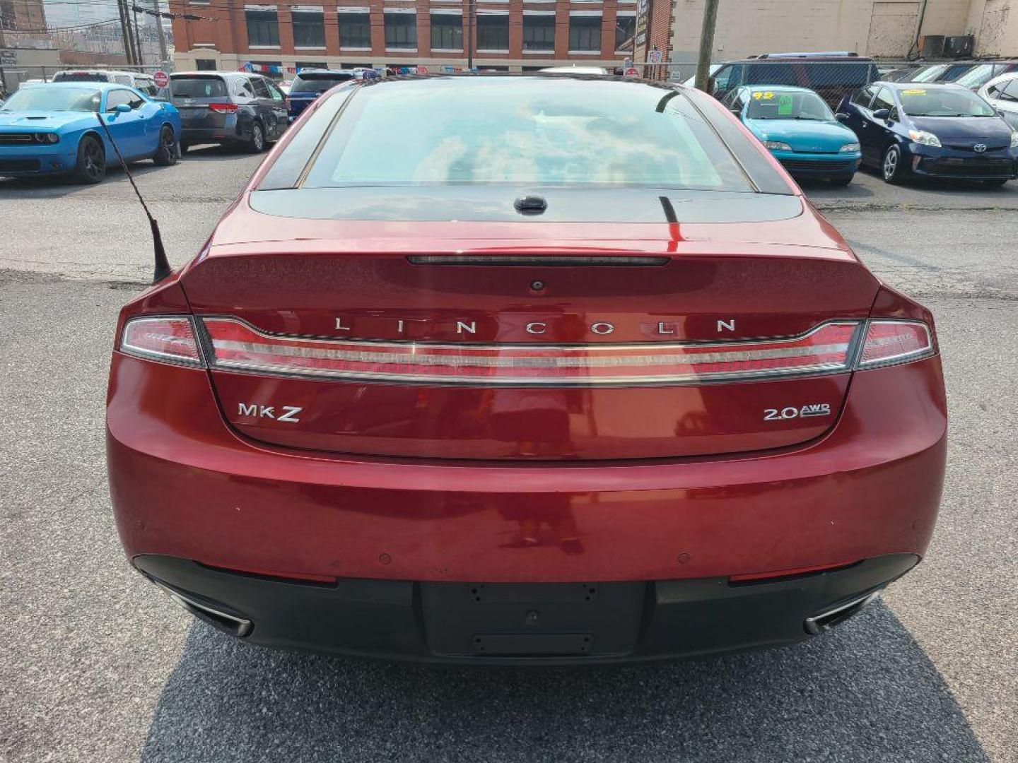 2014 RED LINCOLN MKZ AWD (3LN6L2J97ER) with an 2.0L engine, Automatic transmission, located at 117 North Cameron Street, Harrisburg, PA, 17101, (717) 963-8962, 40.266762, -76.875259 - WE FINANCE!!! Good Credit/ Bad Credit/ No Credit - ALL Trade-Ins Welcomed!!! ***Guaranteed Credit Approval*** APPLY ONLINE or CALL us TODAY ;) Internet Prices and Marketplace Prices are SPECIAL discounted ***CASH DEALS*** Retail Prices are higher. Please call us to discuss your cash and finan - Photo#4