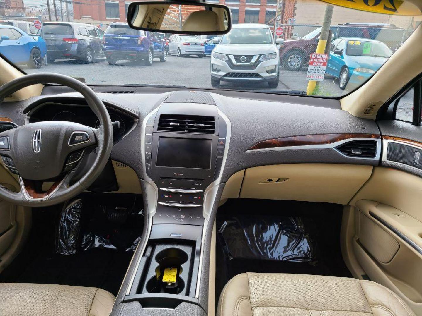 2014 RED LINCOLN MKZ AWD (3LN6L2J97ER) with an 2.0L engine, Automatic transmission, located at 117 North Cameron Street, Harrisburg, PA, 17101, (717) 963-8962, 40.266762, -76.875259 - WE FINANCE!!! Good Credit/ Bad Credit/ No Credit - ALL Trade-Ins Welcomed!!! ***Guaranteed Credit Approval*** APPLY ONLINE or CALL us TODAY ;) Internet Prices and Marketplace Prices are SPECIAL discounted ***CASH DEALS*** Retail Prices are higher. Please call us to discuss your cash and finan - Photo#10