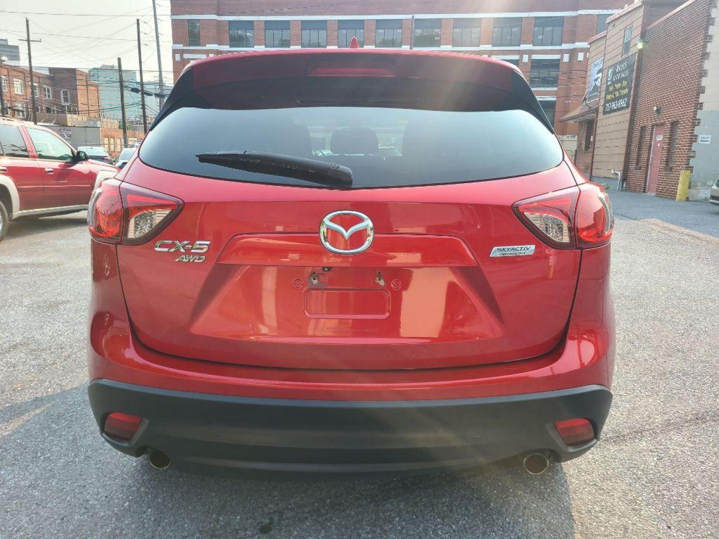 2014 RED MAZDA CX-5 TOURING (JM3KE4CY8E0) with an 2.5L engine, Automatic transmission, located at 7981 Paxton Street, Harrisburg, PA, 17111, (717) 561-2926, 40.261490, -76.749229 - WE FINANCE!!! Good Credit/ Bad Credit/ No Credit - ALL Trade-Ins Welcomed!!! ***Guaranteed Credit Approval*** APPLY ONLINE or CALL us TODAY ;) Internet Prices and Marketplace Prices are SPECIAL discounted ***CASH DEALS*** Retail Prices are higher. Please call us to discuss your cash and finan - Photo#4