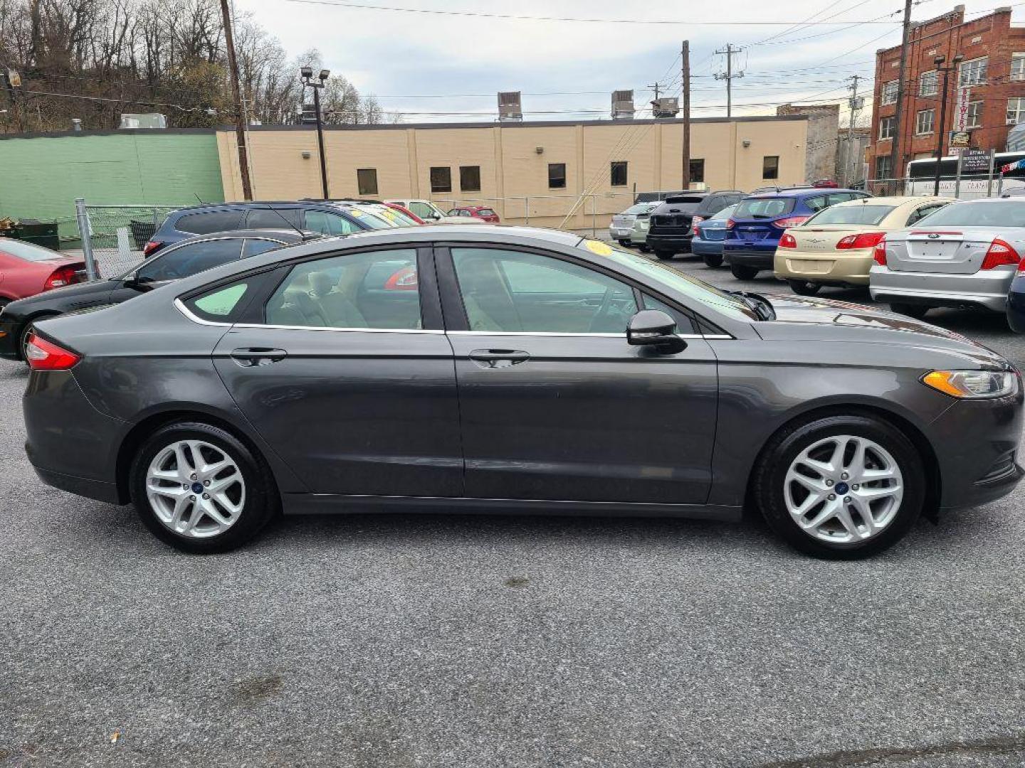 2015 GRAY FORD FUSION SE (1FA6P0H76F5) with an 2.5L engine, Automatic transmission, located at 117 North Cameron Street, Harrisburg, PA, 17101, (717) 963-8962, 40.266762, -76.875259 - WE FINANCE!!! Good Credit/ Bad Credit/ No Credit - ALL Trade-Ins Welcomed!!! ***Guaranteed Credit Approval*** APPLY ONLINE or CALL us TODAY ;) Internet Prices and Marketplace Prices are SPECIAL discounted ***CASH DEALS*** Retail Prices are higher. Please call us to discuss your cash and finan - Photo#5