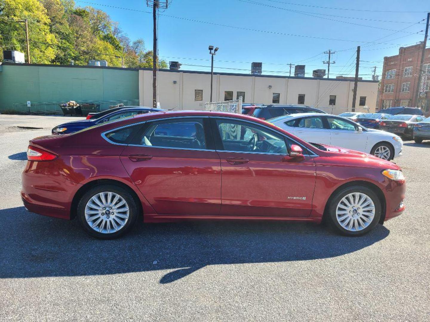 2015 RED FORD FUSION SE HYBRID (3FA6P0LU9FR) with an 2.0L engine, Continuously Variable transmission, located at 117 North Cameron Street, Harrisburg, PA, 17101, (717) 963-8962, 40.266762, -76.875259 - WE FINANCE!!! Good Credit/ Bad Credit/ No Credit - ALL Trade-Ins Welcomed!!! ***Guaranteed Credit Approval*** APPLY ONLINE or CALL us TODAY ;) Please call us to discuss your cash and financing options. - Photo#5