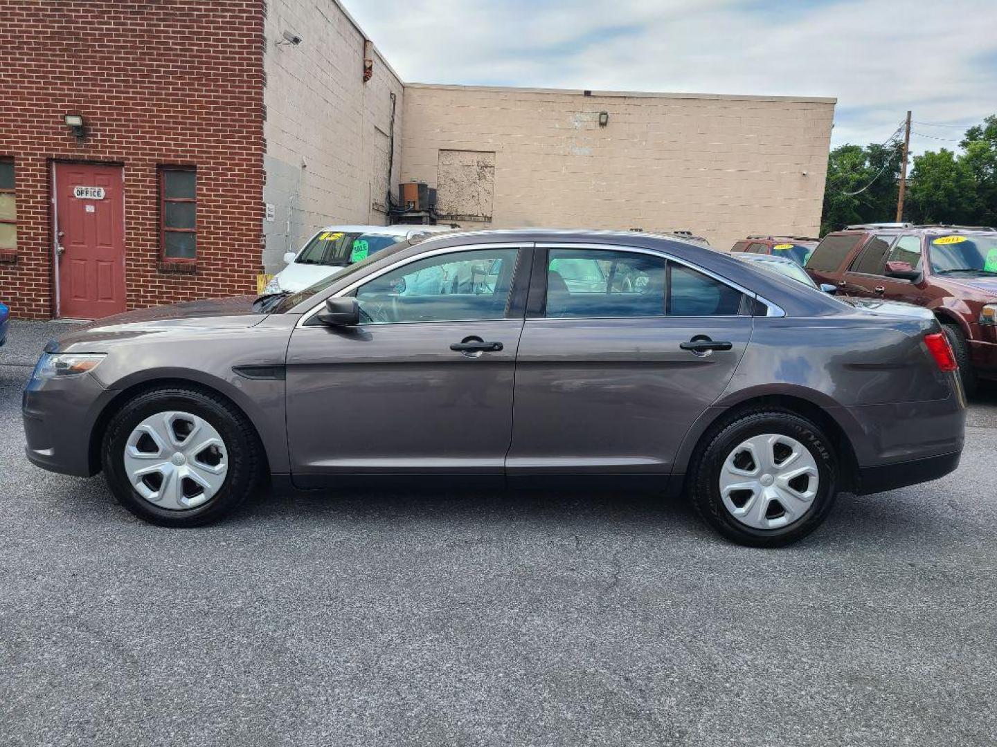 2015 GRAY FORD TAURUS POLICE INTERCEPTOR (1FAHP2MKXFG) with an 3.7L engine, Automatic transmission, located at 7981 Paxton Street, Harrisburg, PA, 17111, (717) 561-2926, 40.261490, -76.749229 - WE FINANCE!!! Good Credit/ Bad Credit/ No Credit - ALL Trade-Ins Welcomed!!! ***Guaranteed Credit Approval*** APPLY ONLINE or CALL us TODAY ;) Internet Prices and Marketplace Prices are SPECIAL discounted ***CASH DEALS*** Retail Prices are higher. Please call us to discuss your cash and finan - Photo#1