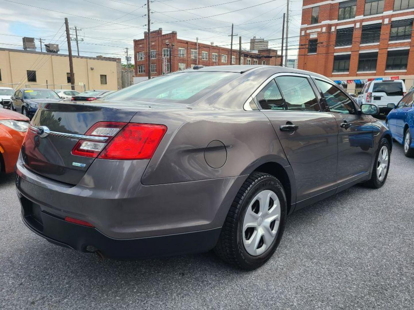 2015 GRAY FORD TAURUS POLICE INTERCEPTOR (1FAHP2MKXFG) with an 3.7L engine, Automatic transmission, located at 7981 Paxton Street, Harrisburg, PA, 17111, (717) 561-2926, 40.261490, -76.749229 - WE FINANCE!!! Good Credit/ Bad Credit/ No Credit - ALL Trade-Ins Welcomed!!! ***Guaranteed Credit Approval*** APPLY ONLINE or CALL us TODAY ;) Internet Prices and Marketplace Prices are SPECIAL discounted ***CASH DEALS*** Retail Prices are higher. Please call us to discuss your cash and finan - Photo#4