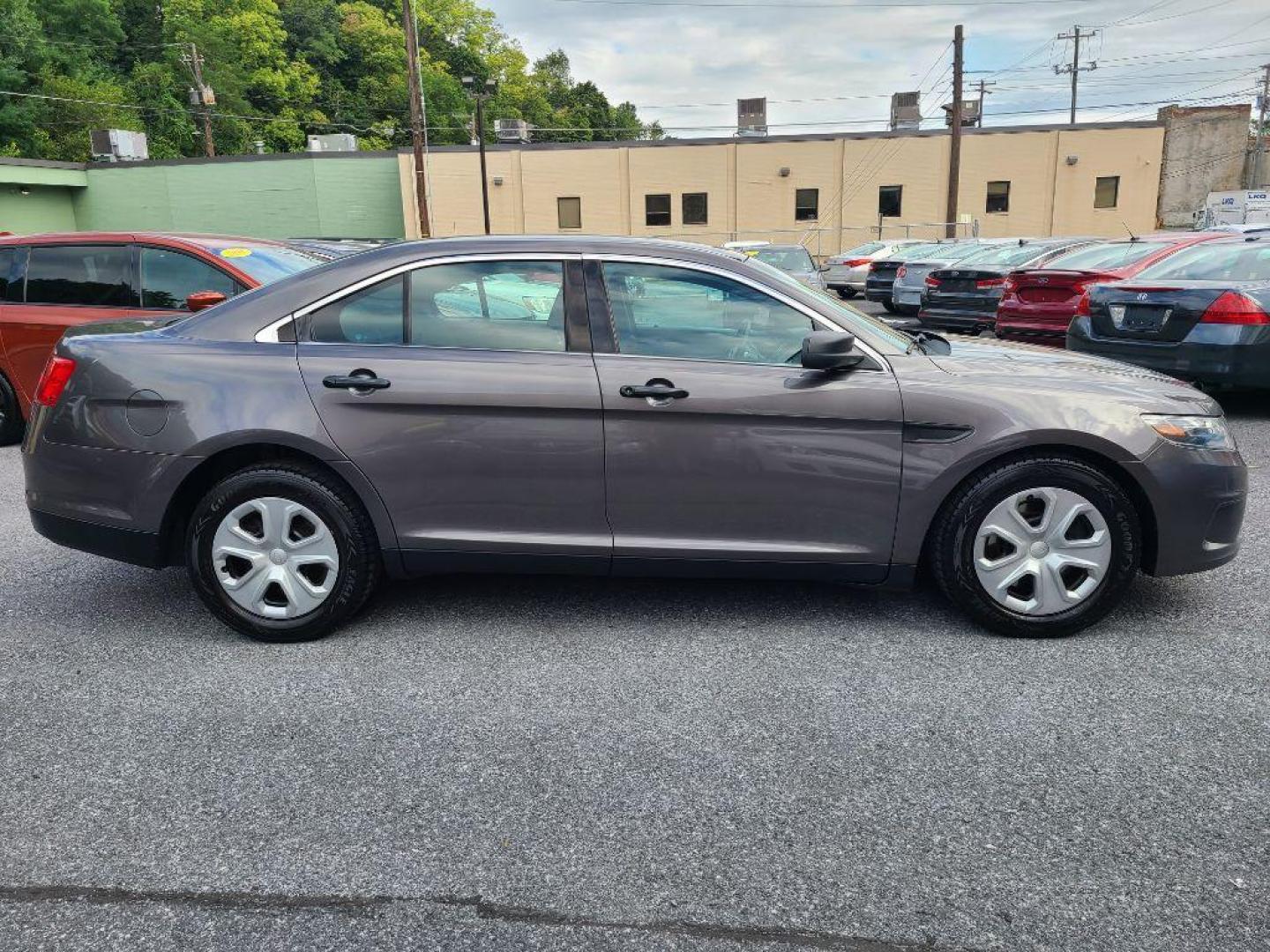 2015 GRAY FORD TAURUS POLICE INTERCEPTOR (1FAHP2MKXFG) with an 3.7L engine, Automatic transmission, located at 7981 Paxton Street, Harrisburg, PA, 17111, (717) 561-2926, 40.261490, -76.749229 - WE FINANCE!!! Good Credit/ Bad Credit/ No Credit - ALL Trade-Ins Welcomed!!! ***Guaranteed Credit Approval*** APPLY ONLINE or CALL us TODAY ;) Internet Prices and Marketplace Prices are SPECIAL discounted ***CASH DEALS*** Retail Prices are higher. Please call us to discuss your cash and finan - Photo#5
