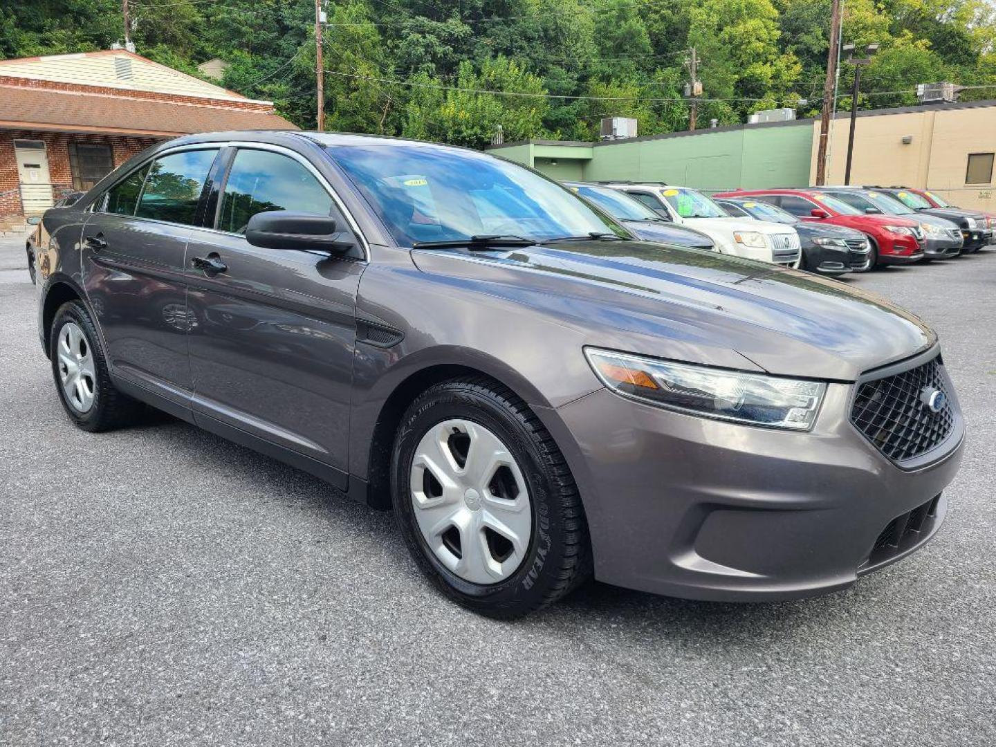 2015 GRAY FORD TAURUS POLICE INTERCEPTOR (1FAHP2MKXFG) with an 3.7L engine, Automatic transmission, located at 7981 Paxton Street, Harrisburg, PA, 17111, (717) 561-2926, 40.261490, -76.749229 - WE FINANCE!!! Good Credit/ Bad Credit/ No Credit - ALL Trade-Ins Welcomed!!! ***Guaranteed Credit Approval*** APPLY ONLINE or CALL us TODAY ;) Internet Prices and Marketplace Prices are SPECIAL discounted ***CASH DEALS*** Retail Prices are higher. Please call us to discuss your cash and finan - Photo#6