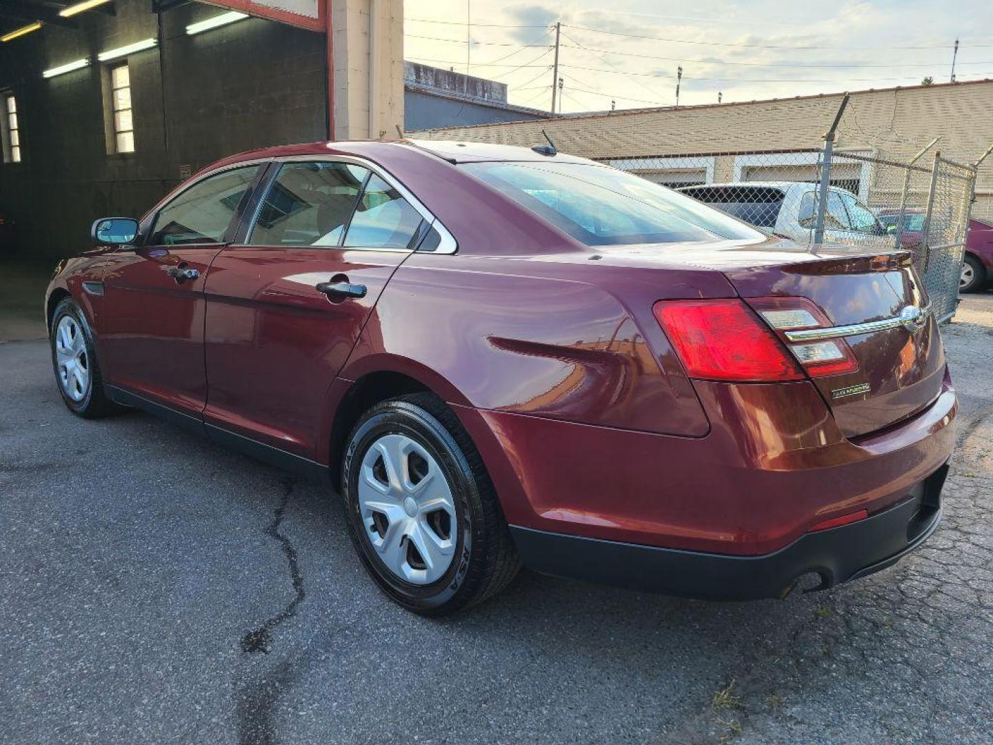 2015 RED FORD TAURUS POLICE INTERCEPTOR (1FAHP2MK5FG) with an 3.7L engine, Automatic transmission, located at 7981 Paxton Street, Harrisburg, PA, 17111, (717) 561-2926, 40.261490, -76.749229 - WE FINANCE!!! Good Credit/ Bad Credit/ No Credit - ALL Trade-Ins Welcomed!!! ***Guaranteed Credit Approval*** APPLY ONLINE or CALL us TODAY ;) Internet Prices and Marketplace Prices are SPECIAL discounted ***CASH DEALS*** Retail Prices are higher. Please call us to discuss your cash and finan - Photo#2