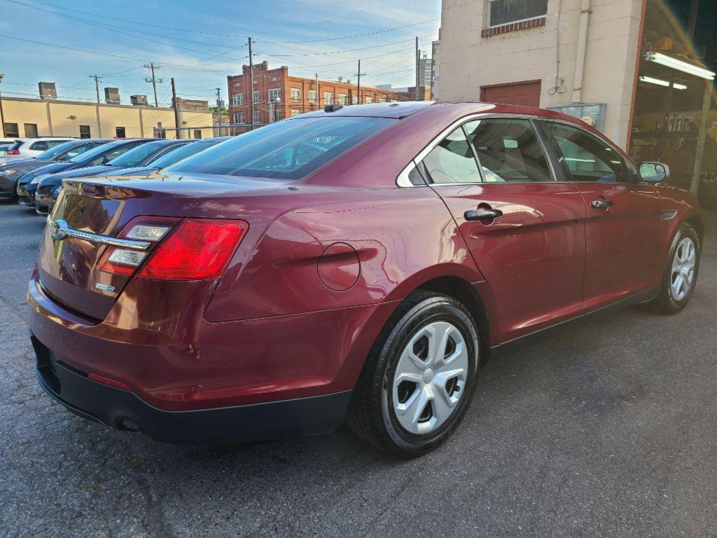 2015 RED FORD TAURUS POLICE INTERCEPTOR (1FAHP2MK5FG) with an 3.7L engine, Automatic transmission, located at 7981 Paxton Street, Harrisburg, PA, 17111, (717) 561-2926, 40.261490, -76.749229 - WE FINANCE!!! Good Credit/ Bad Credit/ No Credit - ALL Trade-Ins Welcomed!!! ***Guaranteed Credit Approval*** APPLY ONLINE or CALL us TODAY ;) Internet Prices and Marketplace Prices are SPECIAL discounted ***CASH DEALS*** Retail Prices are higher. Please call us to discuss your cash and finan - Photo#4