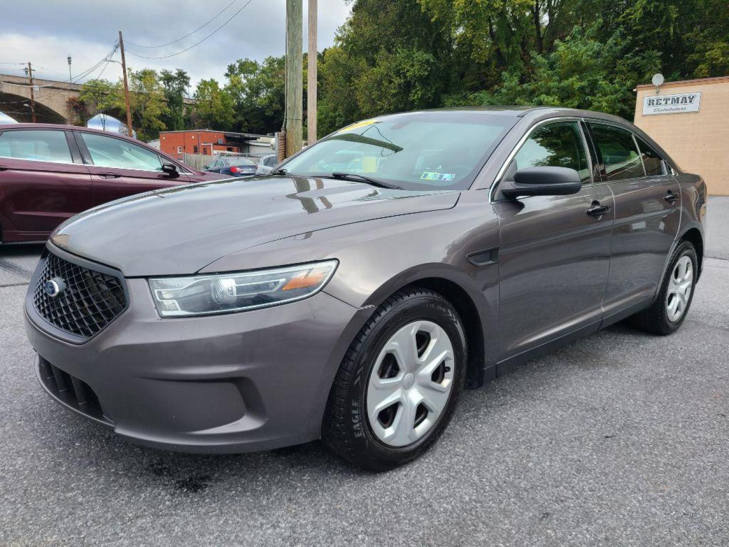 2015 GRAY FORD TAURUS POLICE INTERCEPTOR (1FAHP2MK4FG) with an 3.7L engine, Automatic transmission, located at 117 North Cameron Street, Harrisburg, PA, 17101, (717) 963-8962, 40.266762, -76.875259 - WE FINANCE!!! Good Credit/ Bad Credit/ No Credit - ALL Trade-Ins Welcomed!!! ***Guaranteed Credit Approval*** APPLY ONLINE or CALL us TODAY ;) Please call us to discuss your cash and financing options. - Photo#0