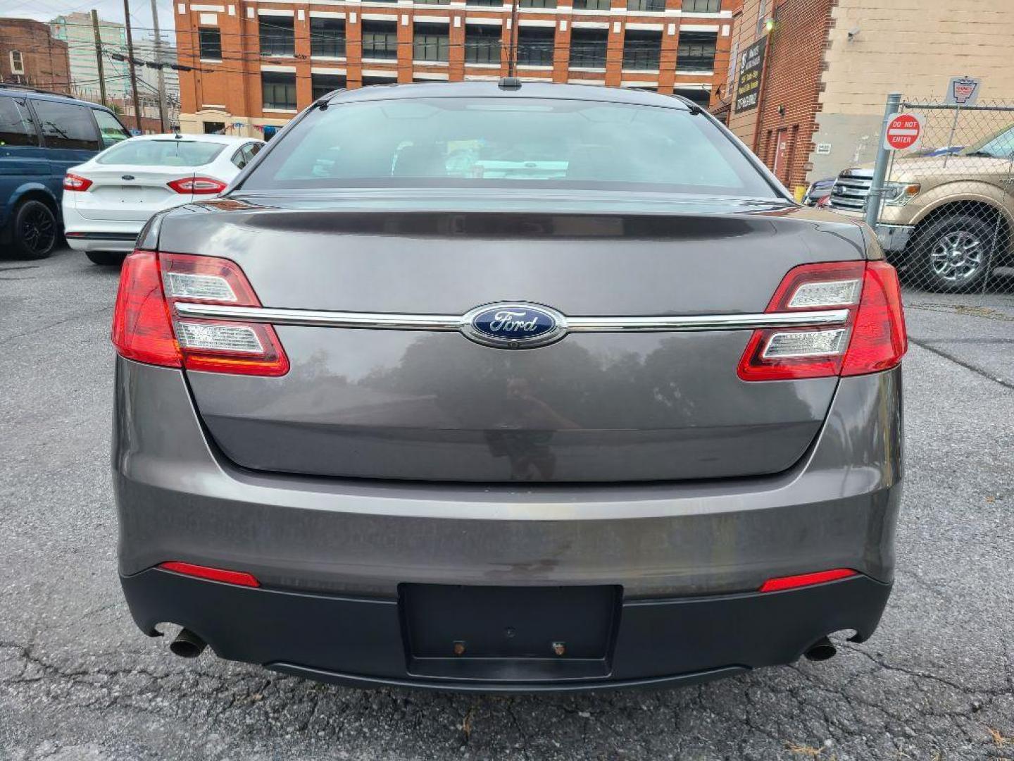 2015 GRAY FORD TAURUS POLICE INTERCEPTOR (1FAHP2MK4FG) with an 3.7L engine, Automatic transmission, located at 117 North Cameron Street, Harrisburg, PA, 17101, (717) 963-8962, 40.266762, -76.875259 - WE FINANCE!!! Good Credit/ Bad Credit/ No Credit - ALL Trade-Ins Welcomed!!! ***Guaranteed Credit Approval*** APPLY ONLINE or CALL us TODAY ;) Please call us to discuss your cash and financing options. - Photo#2