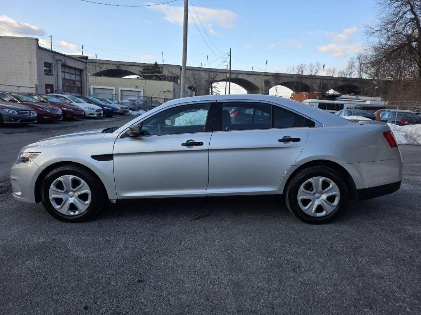 2015 SILVER FORD TAURUS POLICE INTERCEPTOR (1FAHP2MKXFG) with an 3.7L engine, Automatic transmission, located at 117 North Cameron Street, Harrisburg, PA, 17101, (717) 963-8962, 40.266762, -76.875259 - WE FINANCE!!! Good Credit/ Challenged Credit/ No Credit - ALL Trade-Ins Welcomed!!! APPLY ONLINE or CALL us TODAY ;) Please call us to discuss your cash and/or financing options. - Photo#1