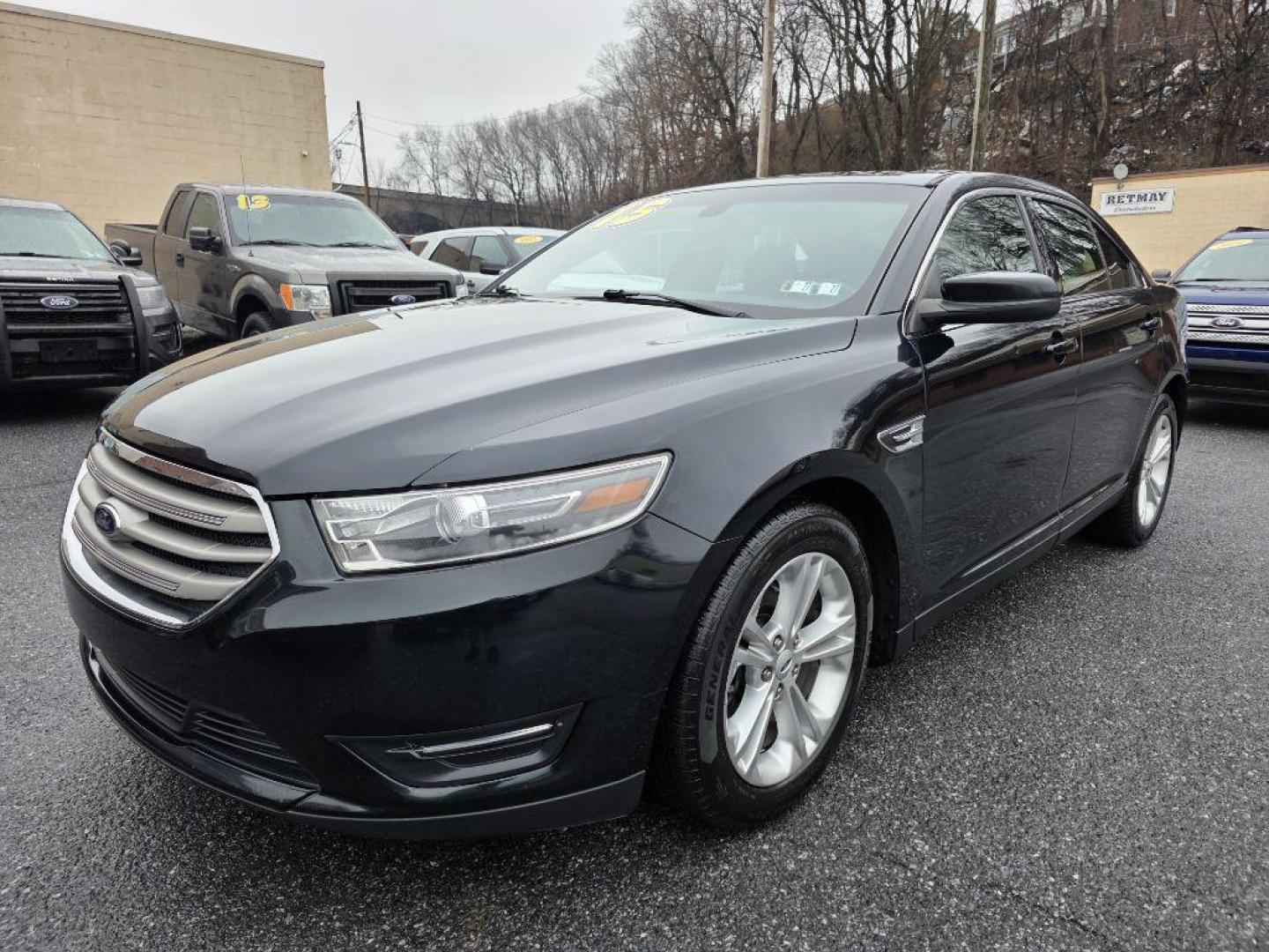 2015 GRAY FORD TAURUS SEL (1FAHP2E82FG) with an 3.5L engine, Automatic transmission, located at 117 North Cameron Street, Harrisburg, PA, 17101, (717) 963-8962, 40.266762, -76.875259 - WE FINANCE!!! Good Credit/ Challenged Credit/ No Credit - ALL Trade-Ins Welcomed!!! APPLY ONLINE or CALL us TODAY ;) Please call us to discuss your cash and/or financing options. - Photo#0