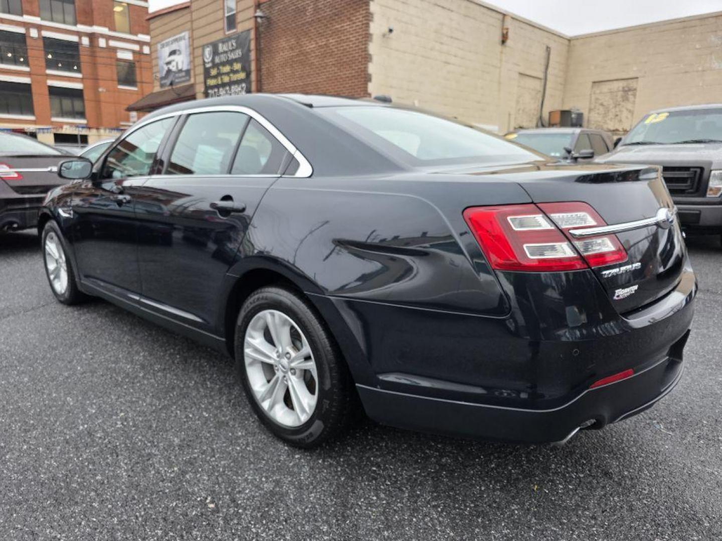 2015 GRAY FORD TAURUS SEL (1FAHP2E82FG) with an 3.5L engine, Automatic transmission, located at 117 North Cameron Street, Harrisburg, PA, 17101, (717) 963-8962, 40.266762, -76.875259 - WE FINANCE!!! Good Credit/ Challenged Credit/ No Credit - ALL Trade-Ins Welcomed!!! APPLY ONLINE or CALL us TODAY ;) Please call us to discuss your cash and/or financing options. - Photo#2