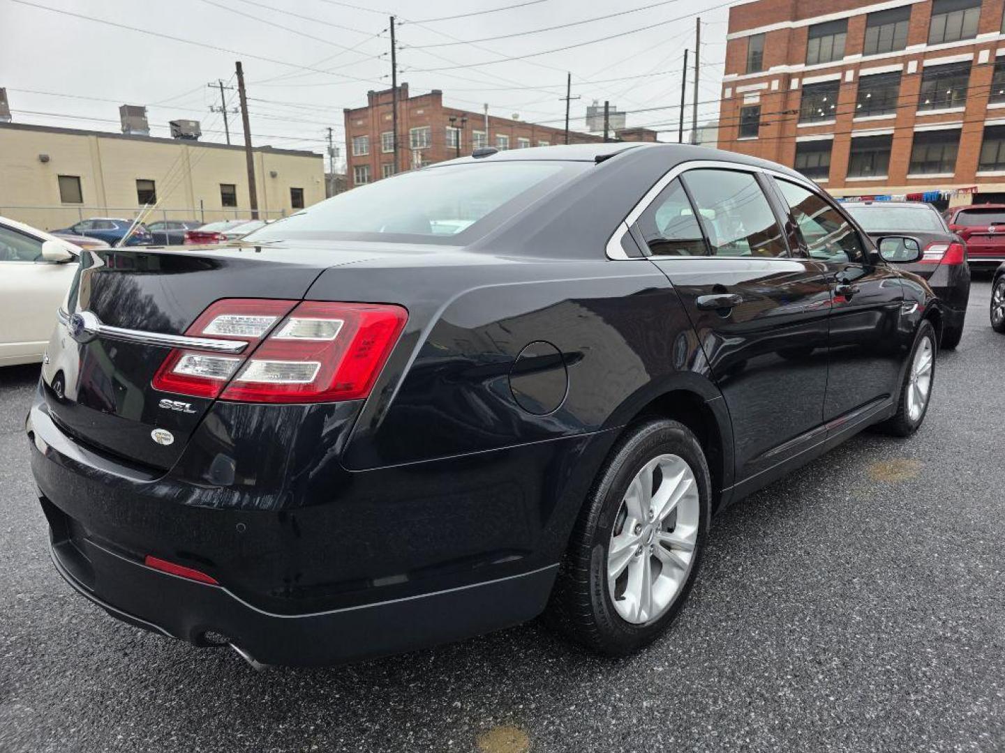 2015 GRAY FORD TAURUS SEL (1FAHP2E82FG) with an 3.5L engine, Automatic transmission, located at 117 North Cameron Street, Harrisburg, PA, 17101, (717) 963-8962, 40.266762, -76.875259 - WE FINANCE!!! Good Credit/ Challenged Credit/ No Credit - ALL Trade-Ins Welcomed!!! APPLY ONLINE or CALL us TODAY ;) Please call us to discuss your cash and/or financing options. - Photo#4