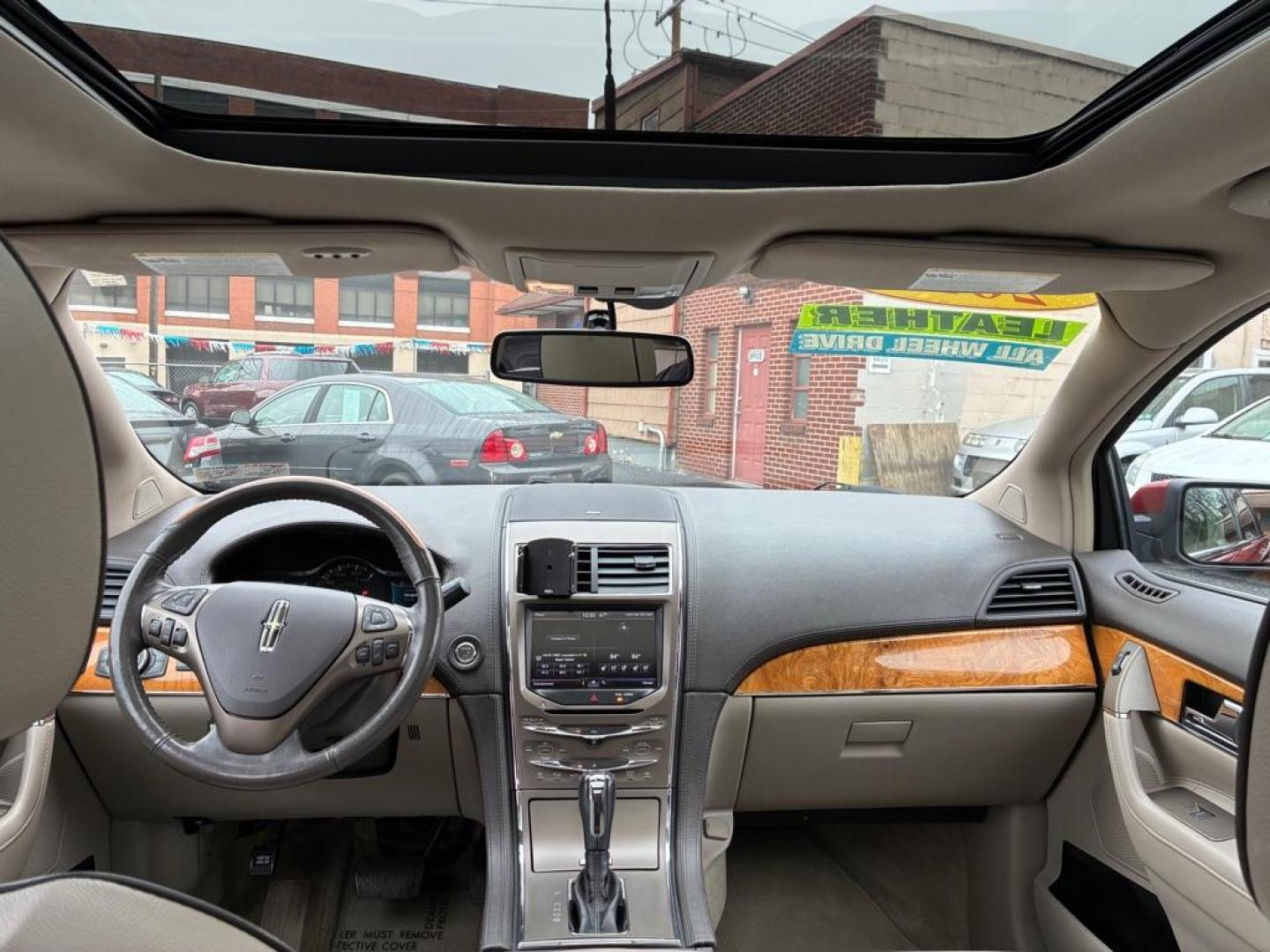 2015 RED LINCOLN MKX (2LMDJ8JK0FB) with an 3.7L engine, Automatic transmission, located at 117 North Cameron Street, Harrisburg, PA, 17101, (717) 963-8962, 40.266762, -76.875259 - WE FINANCE!!! Good Credit/ Challenged Credit/ No Credit - ALL Trade-Ins Welcomed!!! APPLY ONLINE or CALL us TODAY ;) Please call us to discuss your cash and/or financing options. - Photo#12