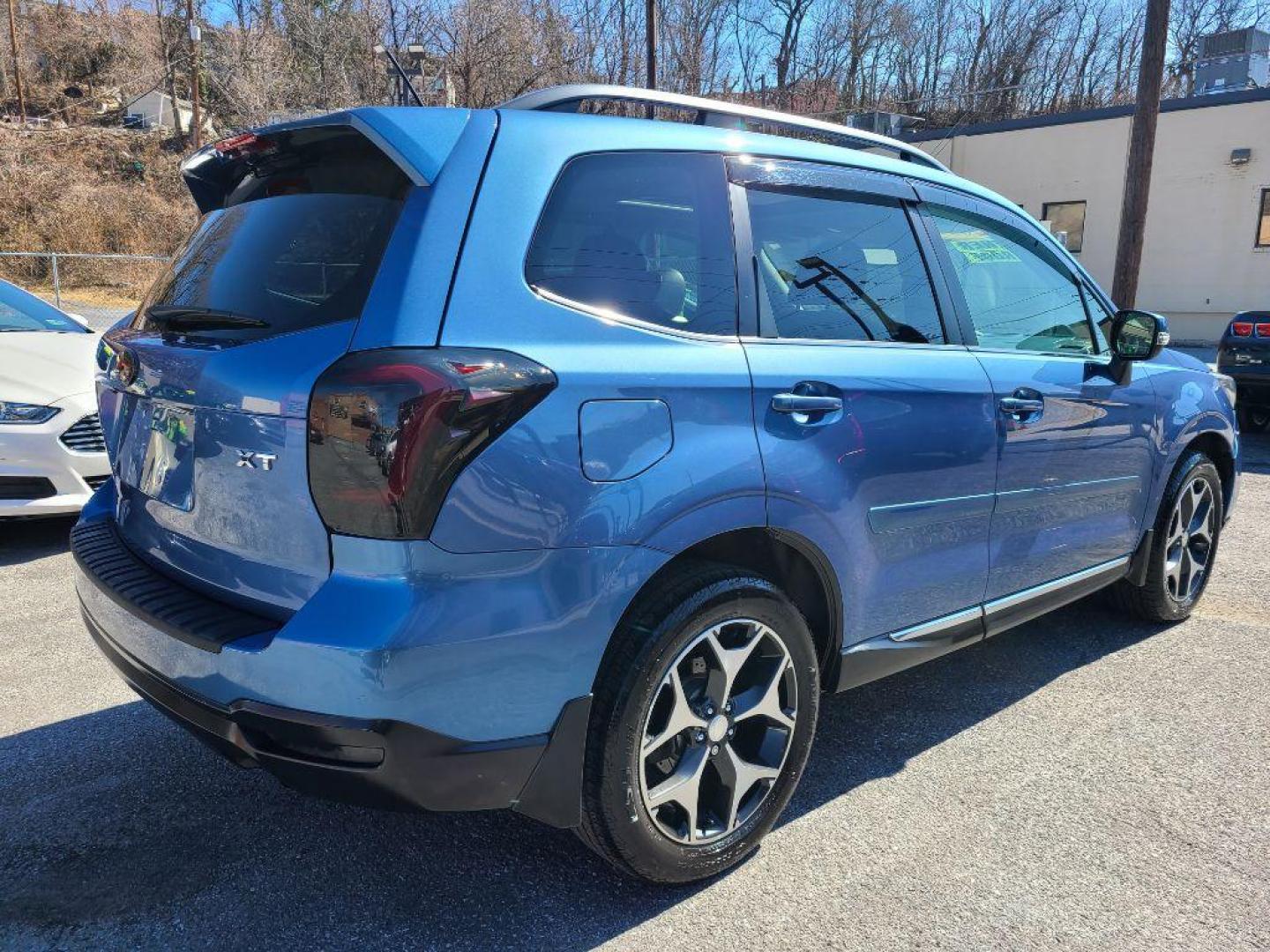 2015 BLUE SUBARU FORESTER 2.0XT TOURING (JF2SJGWC1FH) with an 2.0L engine, Continuously Variable transmission, located at 7981 Paxton Street, Harrisburg, PA, 17111, (717) 561-2926, 40.261490, -76.749229 - WE FINANCE!!! Good Credit/ Bad Credit/ No Credit - ALL Trade-Ins Welcomed!!! ***Guaranteed Credit Approval*** APPLY ONLINE or CALL us TODAY ;) Internet Prices and Marketplace Prices are SPECIAL discounted ***CASH DEALS*** Retail Prices are higher. Please call us to discuss your cash and finan - Photo#2
