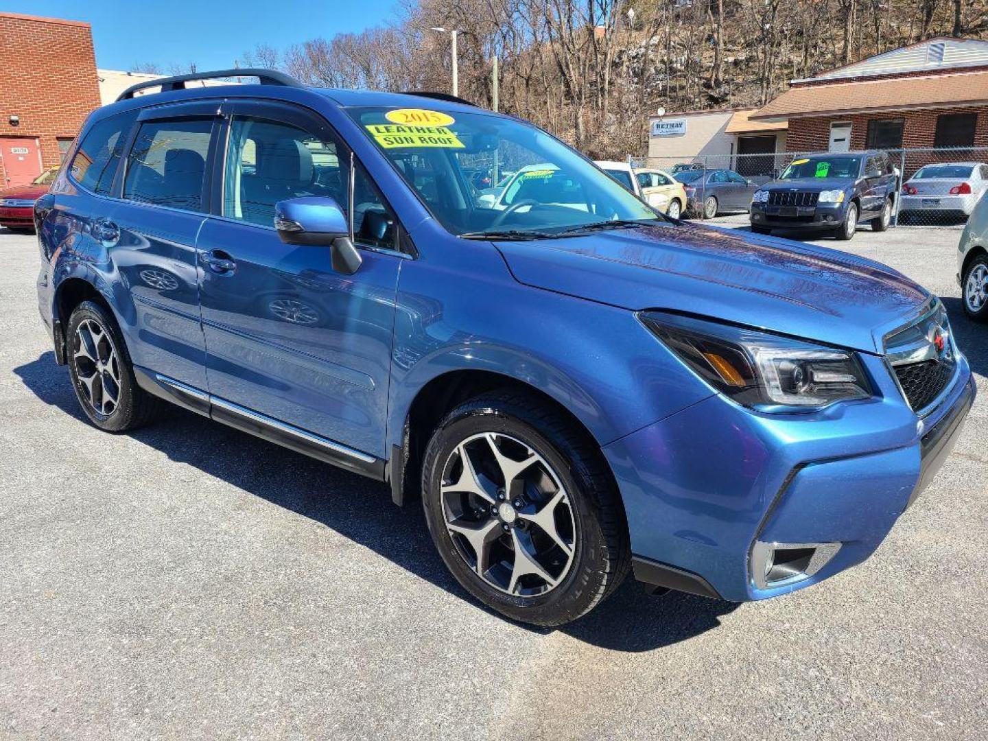 2015 BLUE SUBARU FORESTER 2.0XT TOURING (JF2SJGWC1FH) with an 2.0L engine, Continuously Variable transmission, located at 7981 Paxton Street, Harrisburg, PA, 17111, (717) 561-2926, 40.261490, -76.749229 - WE FINANCE!!! Good Credit/ Bad Credit/ No Credit - ALL Trade-Ins Welcomed!!! ***Guaranteed Credit Approval*** APPLY ONLINE or CALL us TODAY ;) Internet Prices and Marketplace Prices are SPECIAL discounted ***CASH DEALS*** Retail Prices are higher. Please call us to discuss your cash and finan - Photo#3