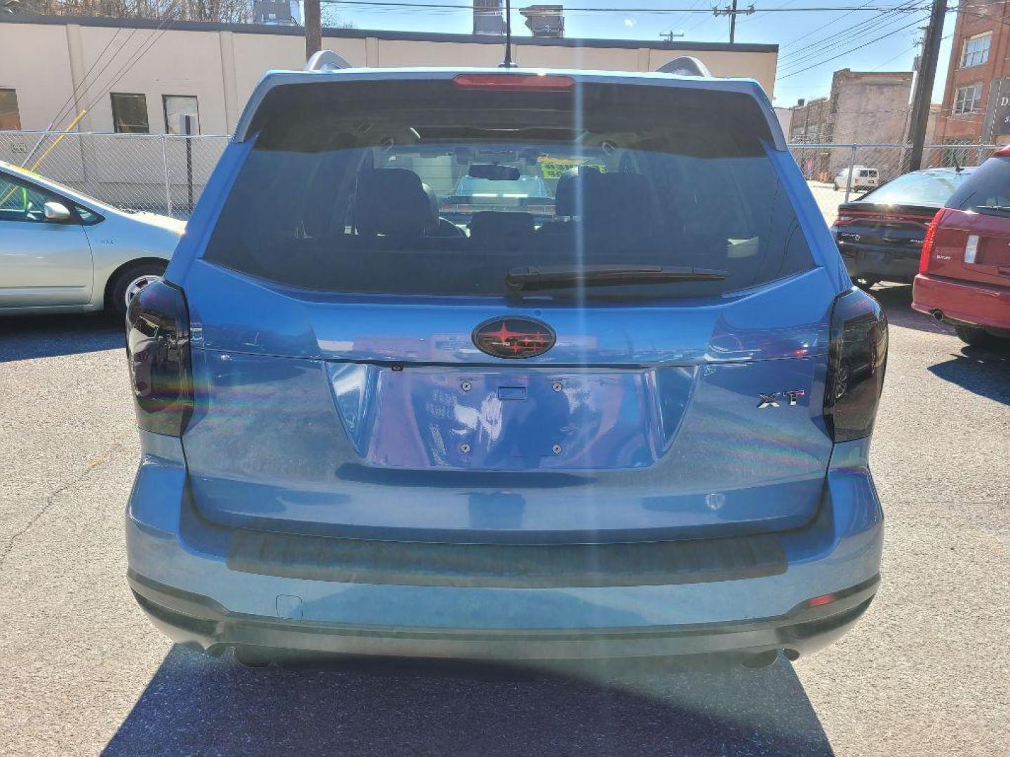 2015 BLUE SUBARU FORESTER 2.0XT TOURING (JF2SJGWC1FH) with an 2.0L engine, Continuously Variable transmission, located at 7981 Paxton Street, Harrisburg, PA, 17111, (717) 561-2926, 40.261490, -76.749229 - WE FINANCE!!! Good Credit/ Bad Credit/ No Credit - ALL Trade-Ins Welcomed!!! ***Guaranteed Credit Approval*** APPLY ONLINE or CALL us TODAY ;) Internet Prices and Marketplace Prices are SPECIAL discounted ***CASH DEALS*** Retail Prices are higher. Please call us to discuss your cash and finan - Photo#4
