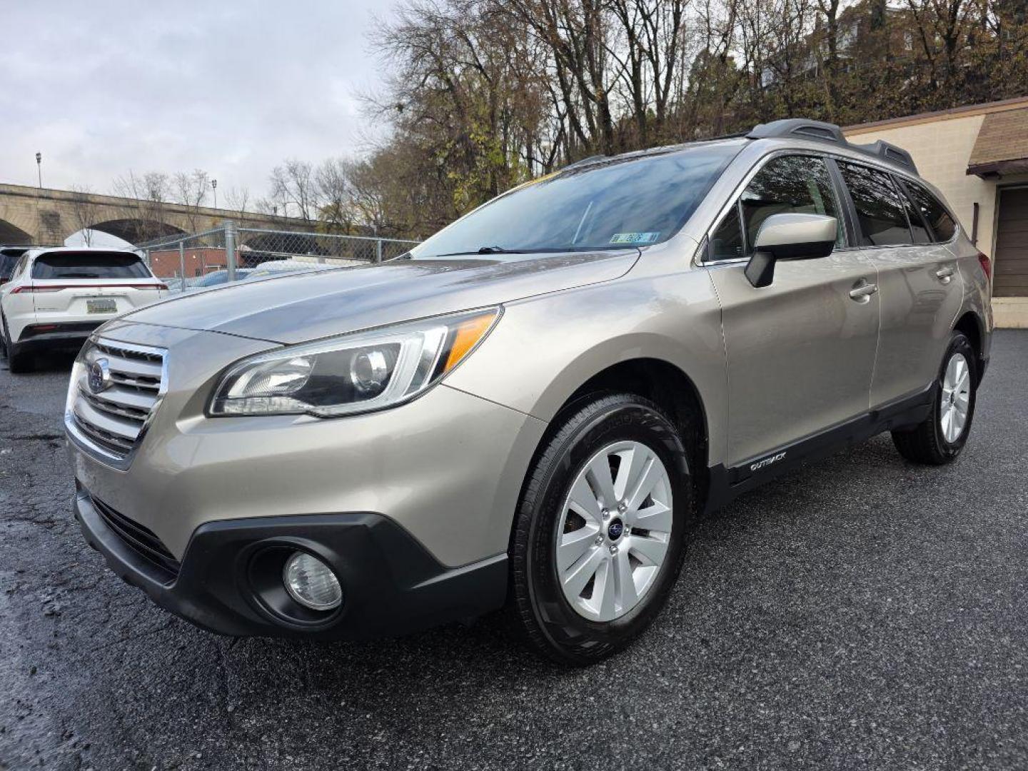 2015 TAN SUBARU OUTBACK 2.5I PREMIUM (4S4BSAEC5F3) with an 2.5L engine, Continuously Variable transmission, located at 7981 Paxton Street, Harrisburg, PA, 17111, (717) 561-2926, 40.261490, -76.749229 - WE FINANCE!!! Good Credit/ Bad Credit/ No Credit - ALL Trade-Ins Welcomed!!! ***Guaranteed Credit Approval*** APPLY ONLINE or CALL us TODAY ;) Please call us to discuss your cash and financing options. - Photo#0