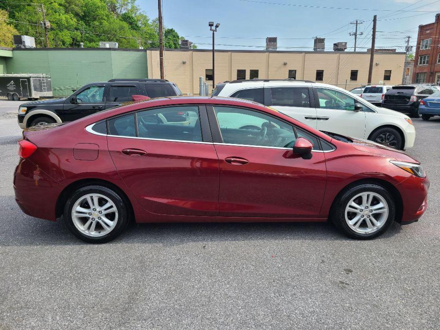 2016 RED CHEVROLET CRUZE LT (1G1BE5SM0G7) with an 1.4L engine, Automatic transmission, located at 7981 Paxton Street, Harrisburg, PA, 17111, (717) 561-2926, 40.261490, -76.749229 - WE FINANCE!!! Good Credit/ Bad Credit/ No Credit - ALL Trade-Ins Welcomed!!! ***Guaranteed Credit Approval*** APPLY ONLINE or CALL us TODAY ;) Internet Prices and Marketplace Prices are SPECIAL discounted ***CASH DEALS*** Retail Prices are higher. Please call us to discuss your cash and finan - Photo#3