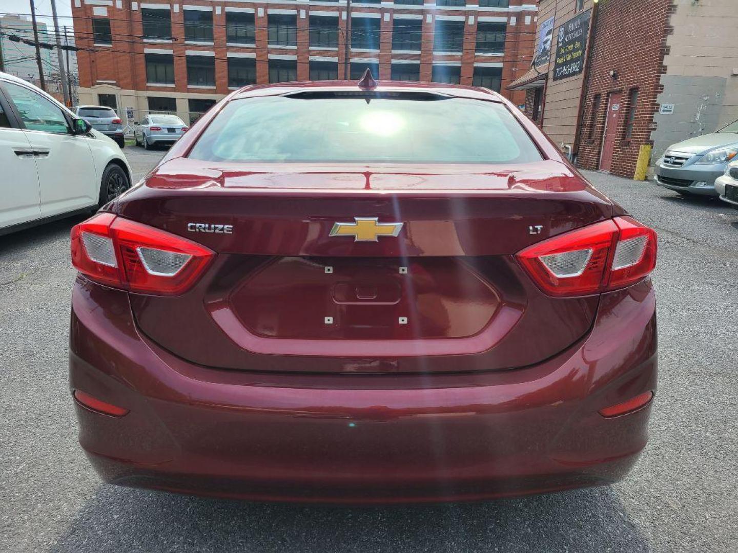 2016 RED CHEVROLET CRUZE LT (1G1BE5SM0G7) with an 1.4L engine, Automatic transmission, located at 7981 Paxton Street, Harrisburg, PA, 17111, (717) 561-2926, 40.261490, -76.749229 - WE FINANCE!!! Good Credit/ Bad Credit/ No Credit - ALL Trade-Ins Welcomed!!! ***Guaranteed Credit Approval*** APPLY ONLINE or CALL us TODAY ;) Internet Prices and Marketplace Prices are SPECIAL discounted ***CASH DEALS*** Retail Prices are higher. Please call us to discuss your cash and finan - Photo#4