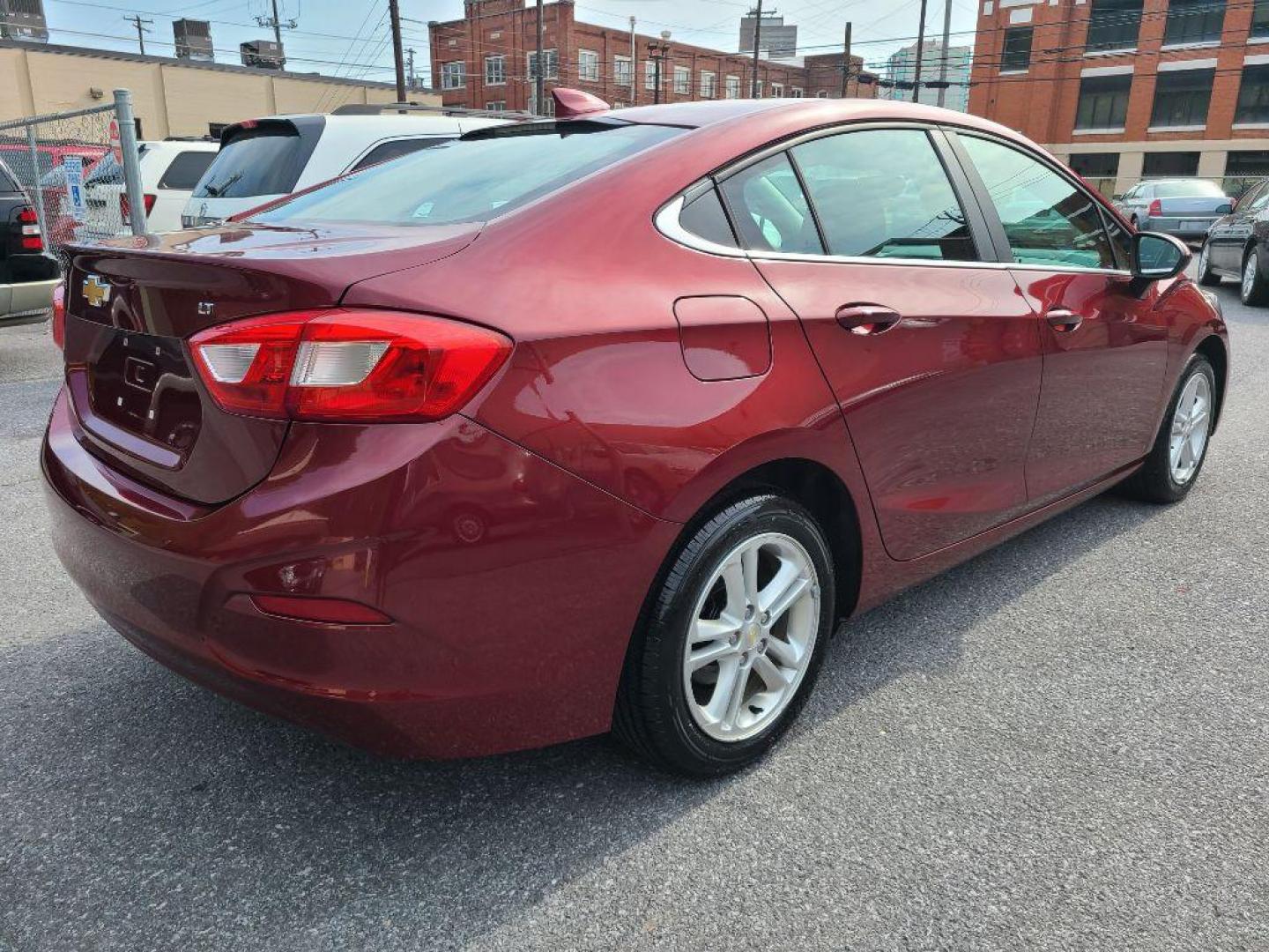 2016 RED CHEVROLET CRUZE LT (1G1BE5SM0G7) with an 1.4L engine, Automatic transmission, located at 7981 Paxton Street, Harrisburg, PA, 17111, (717) 561-2926, 40.261490, -76.749229 - WE FINANCE!!! Good Credit/ Bad Credit/ No Credit - ALL Trade-Ins Welcomed!!! ***Guaranteed Credit Approval*** APPLY ONLINE or CALL us TODAY ;) Internet Prices and Marketplace Prices are SPECIAL discounted ***CASH DEALS*** Retail Prices are higher. Please call us to discuss your cash and finan - Photo#5