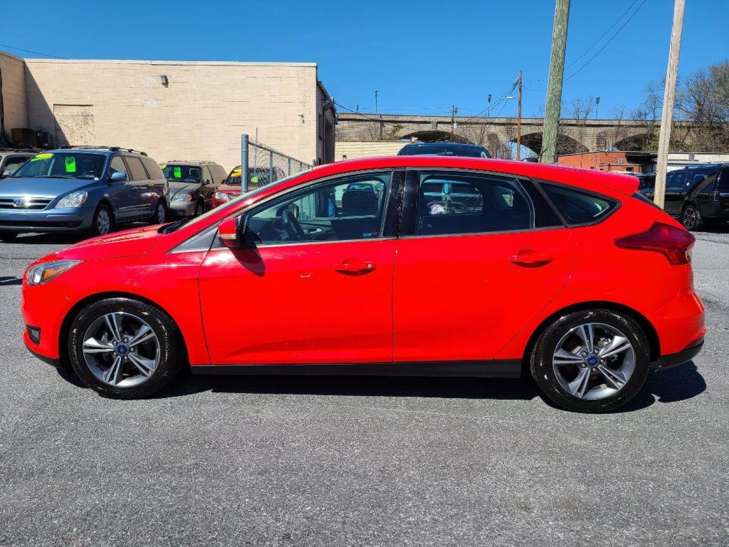 2016 RED FORD FOCUS SE (1FADP3KE0GL) with an 1.0L engine, Automatic transmission, located at 7981 Paxton Street, Harrisburg, PA, 17111, (717) 561-2926, 40.261490, -76.749229 - WE FINANCE!!! Good Credit/ Bad Credit/ No Credit - ALL Trade-Ins Welcomed!!! ***Guaranteed Credit Approval*** APPLY ONLINE or CALL us TODAY ;) Internet Prices and Marketplace Prices are SPECIAL discounted ***CASH DEALS*** Retail Prices are higher. Please call us to discuss your cash and finan - Photo#1