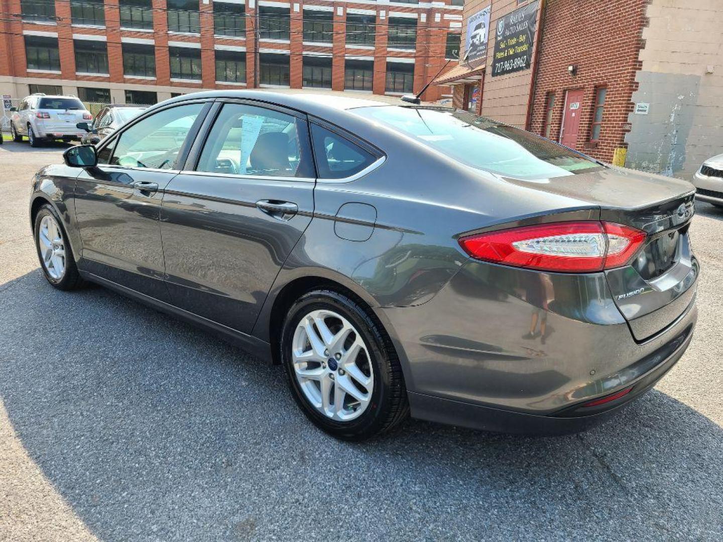 2016 GRAY FORD FUSION SE (3FA6P0H70GR) with an 2.5L engine, Automatic transmission, located at 117 North Cameron Street, Harrisburg, PA, 17101, (717) 963-8962, 40.266762, -76.875259 - WE FINANCE!!! Good Credit/ Bad Credit/ No Credit - ALL Trade-Ins Welcomed!!! ***Guaranteed Credit Approval*** APPLY ONLINE or CALL us TODAY ;) Internet Prices and Marketplace Prices are SPECIAL discounted ***CASH DEALS*** Retail Prices are higher. Please call us to discuss your cash and finan - Photo#2