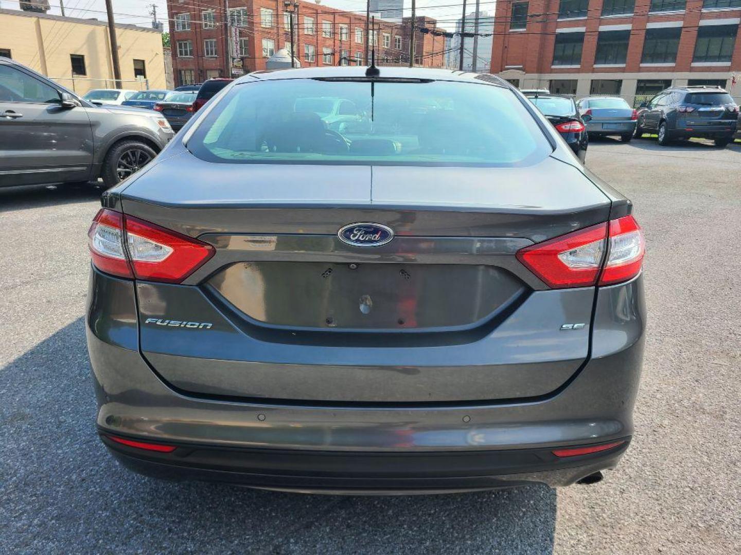 2016 GRAY FORD FUSION SE (3FA6P0H70GR) with an 2.5L engine, Automatic transmission, located at 117 North Cameron Street, Harrisburg, PA, 17101, (717) 963-8962, 40.266762, -76.875259 - WE FINANCE!!! Good Credit/ Bad Credit/ No Credit - ALL Trade-Ins Welcomed!!! ***Guaranteed Credit Approval*** APPLY ONLINE or CALL us TODAY ;) Internet Prices and Marketplace Prices are SPECIAL discounted ***CASH DEALS*** Retail Prices are higher. Please call us to discuss your cash and finan - Photo#3