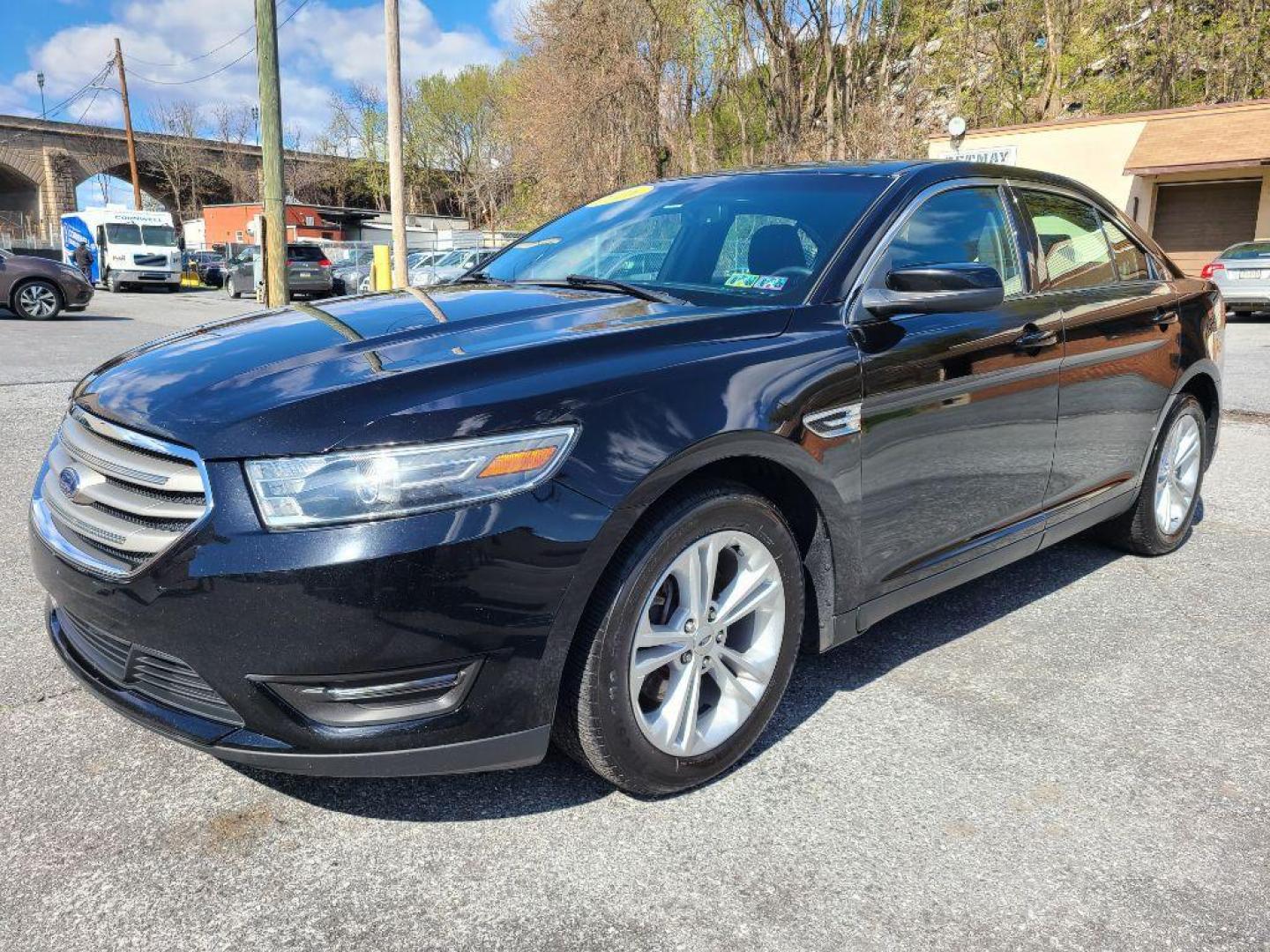 2016 BLACK FORD TAURUS SEL (1FAHP2E85GG) with an 3.5L engine, Automatic transmission, located at 117 North Cameron Street, Harrisburg, PA, 17101, (717) 963-8962, 40.266762, -76.875259 - WE FINANCE!!! Good Credit/ Bad Credit/ No Credit - ALL Trade-Ins Welcomed!!! ***Guaranteed Credit Approval*** APPLY ONLINE or CALL us TODAY ;) Internet Prices and Marketplace Prices are SPECIAL discounted ***CASH DEALS*** Retail Prices are higher. Please call us to discuss your cash and finan - Photo#0