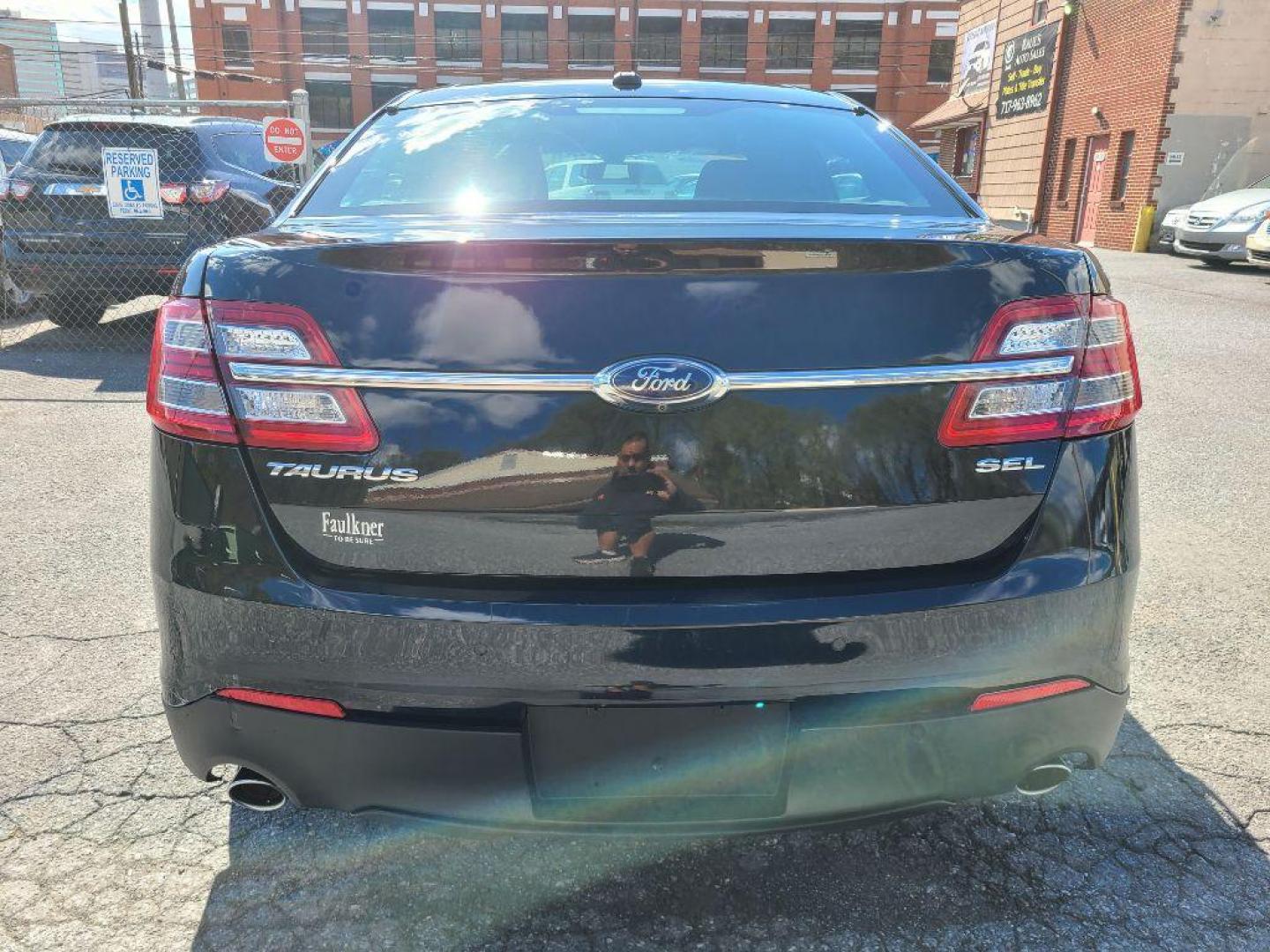 2016 BLACK FORD TAURUS SEL (1FAHP2E85GG) with an 3.5L engine, Automatic transmission, located at 117 North Cameron Street, Harrisburg, PA, 17101, (717) 963-8962, 40.266762, -76.875259 - WE FINANCE!!! Good Credit/ Bad Credit/ No Credit - ALL Trade-Ins Welcomed!!! ***Guaranteed Credit Approval*** APPLY ONLINE or CALL us TODAY ;) Internet Prices and Marketplace Prices are SPECIAL discounted ***CASH DEALS*** Retail Prices are higher. Please call us to discuss your cash and finan - Photo#1