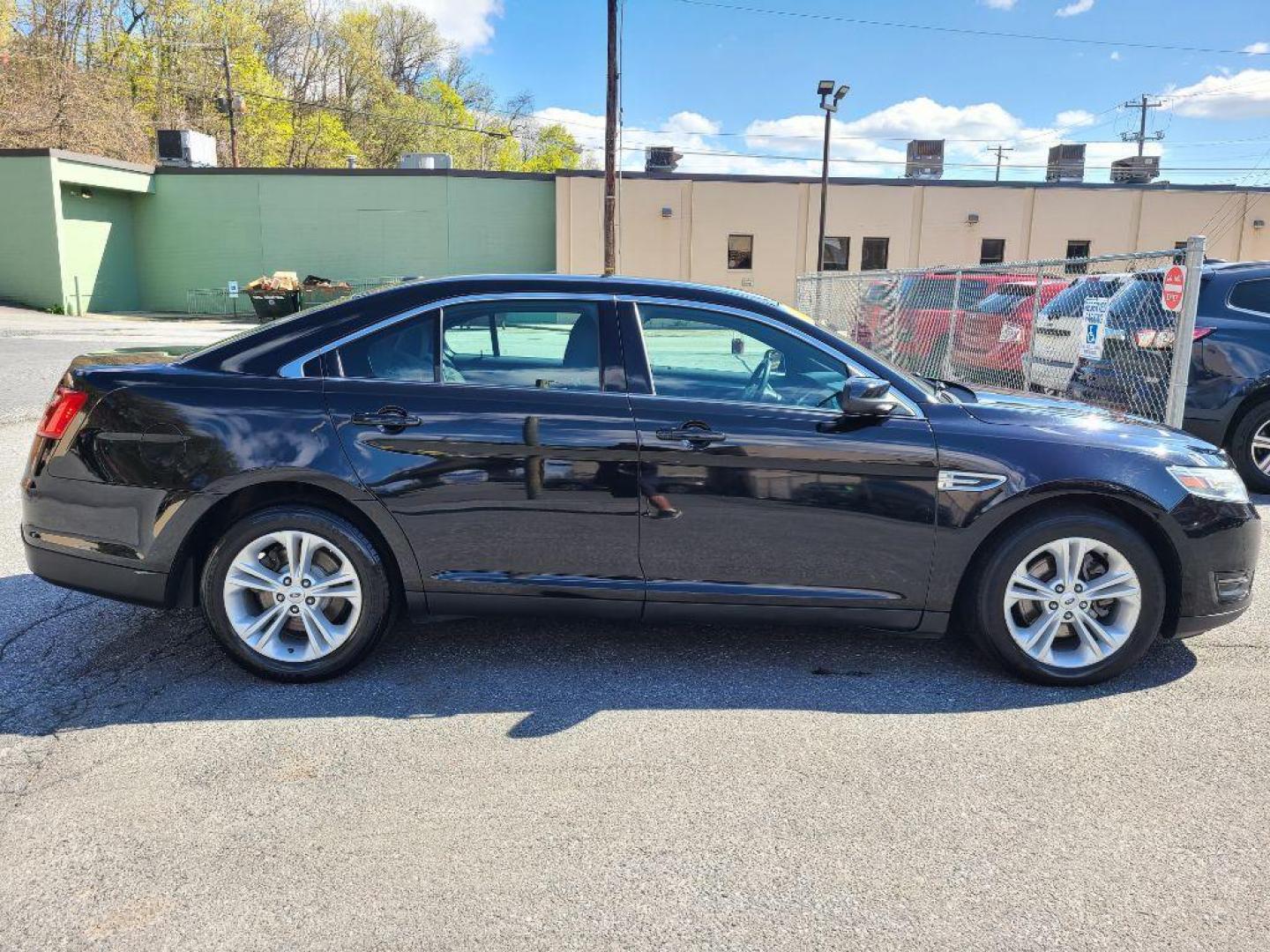 2016 BLACK FORD TAURUS SEL (1FAHP2E85GG) with an 3.5L engine, Automatic transmission, located at 117 North Cameron Street, Harrisburg, PA, 17101, (717) 963-8962, 40.266762, -76.875259 - WE FINANCE!!! Good Credit/ Bad Credit/ No Credit - ALL Trade-Ins Welcomed!!! ***Guaranteed Credit Approval*** APPLY ONLINE or CALL us TODAY ;) Internet Prices and Marketplace Prices are SPECIAL discounted ***CASH DEALS*** Retail Prices are higher. Please call us to discuss your cash and finan - Photo#2