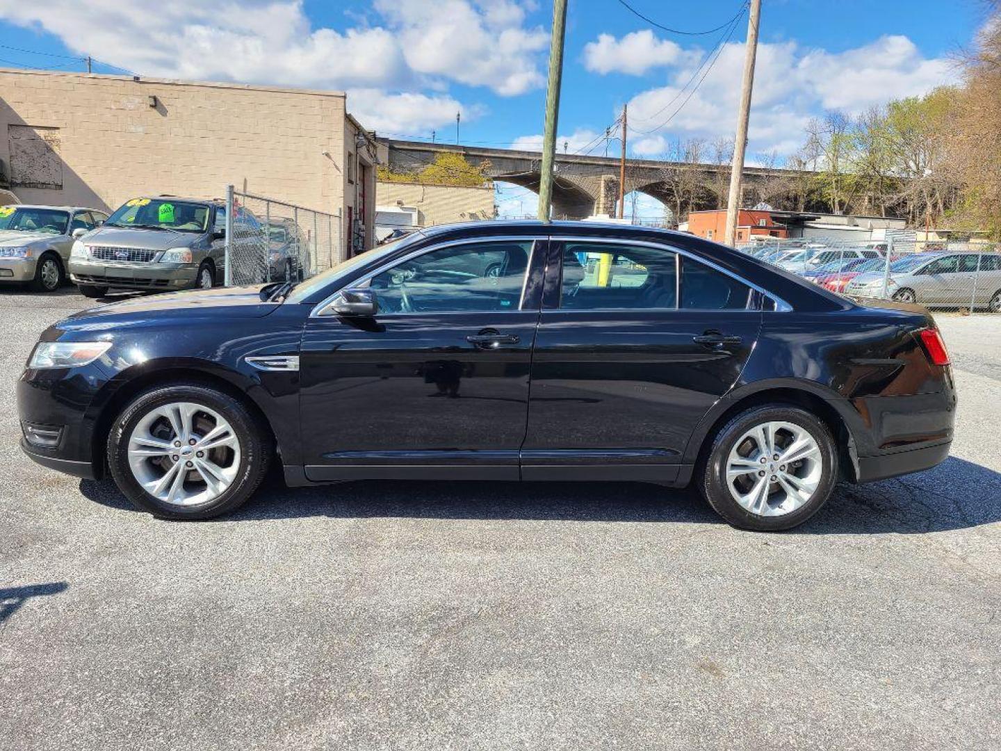 2016 BLACK FORD TAURUS SEL (1FAHP2E85GG) with an 3.5L engine, Automatic transmission, located at 117 North Cameron Street, Harrisburg, PA, 17101, (717) 963-8962, 40.266762, -76.875259 - WE FINANCE!!! Good Credit/ Bad Credit/ No Credit - ALL Trade-Ins Welcomed!!! ***Guaranteed Credit Approval*** APPLY ONLINE or CALL us TODAY ;) Internet Prices and Marketplace Prices are SPECIAL discounted ***CASH DEALS*** Retail Prices are higher. Please call us to discuss your cash and finan - Photo#3
