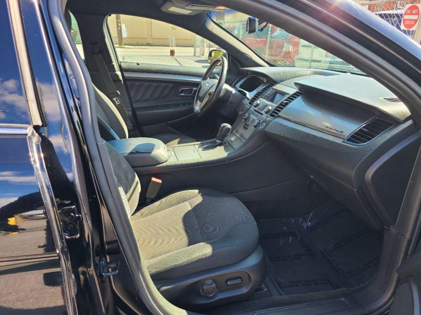 2016 BLACK FORD TAURUS SEL (1FAHP2E85GG) with an 3.5L engine, Automatic transmission, located at 117 North Cameron Street, Harrisburg, PA, 17101, (717) 963-8962, 40.266762, -76.875259 - WE FINANCE!!! Good Credit/ Bad Credit/ No Credit - ALL Trade-Ins Welcomed!!! ***Guaranteed Credit Approval*** APPLY ONLINE or CALL us TODAY ;) Internet Prices and Marketplace Prices are SPECIAL discounted ***CASH DEALS*** Retail Prices are higher. Please call us to discuss your cash and finan - Photo#8