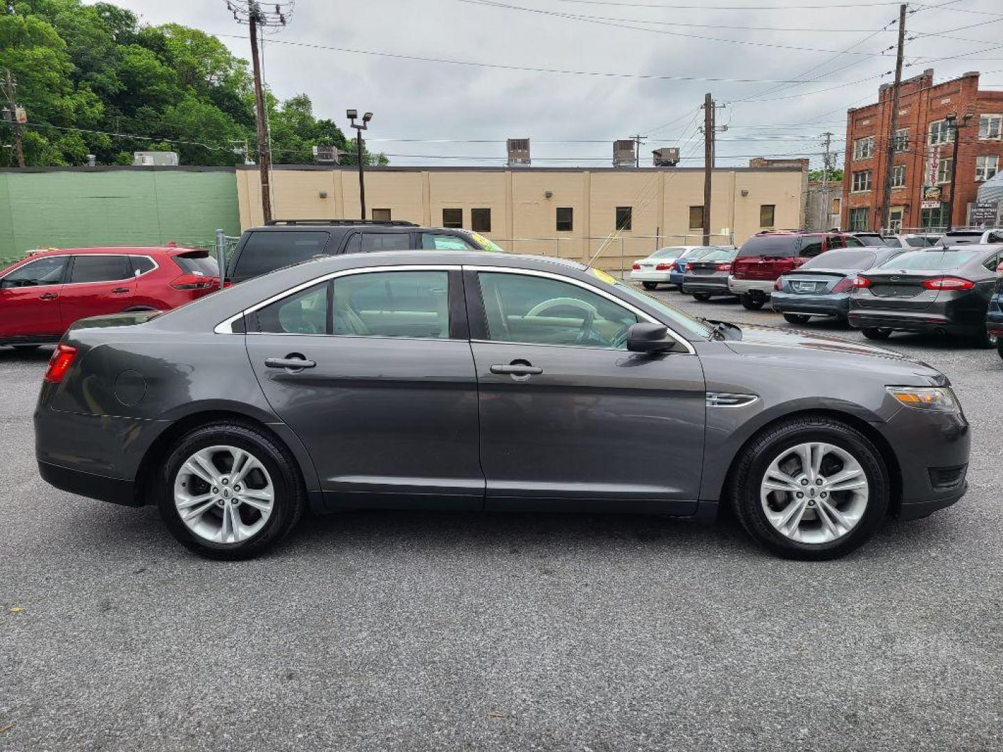 2016 GRAY FORD TAURUS SE (1FAHP2D80GG) with an 3.5L engine, Automatic transmission, located at 117 North Cameron Street, Harrisburg, PA, 17101, (717) 963-8962, 40.266762, -76.875259 - WE FINANCE!!! Good Credit/ Bad Credit/ No Credit - ALL Trade-Ins Welcomed!!! ***Guaranteed Credit Approval*** APPLY ONLINE or CALL us TODAY ;) Internet Prices and Marketplace Prices are SPECIAL discounted ***CASH DEALS*** Retail Prices are higher. Please call us to discuss your cash and finan - Photo#1
