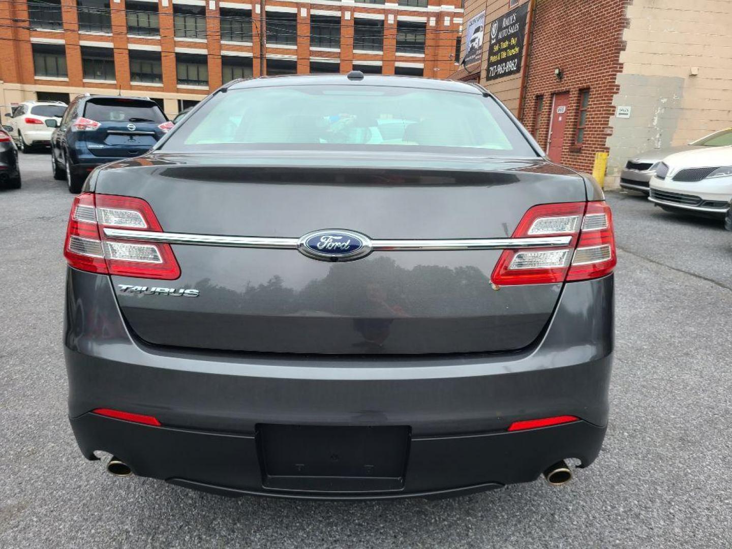 2016 GRAY FORD TAURUS SE (1FAHP2D80GG) with an 3.5L engine, Automatic transmission, located at 117 North Cameron Street, Harrisburg, PA, 17101, (717) 963-8962, 40.266762, -76.875259 - WE FINANCE!!! Good Credit/ Bad Credit/ No Credit - ALL Trade-Ins Welcomed!!! ***Guaranteed Credit Approval*** APPLY ONLINE or CALL us TODAY ;) Internet Prices and Marketplace Prices are SPECIAL discounted ***CASH DEALS*** Retail Prices are higher. Please call us to discuss your cash and finan - Photo#2