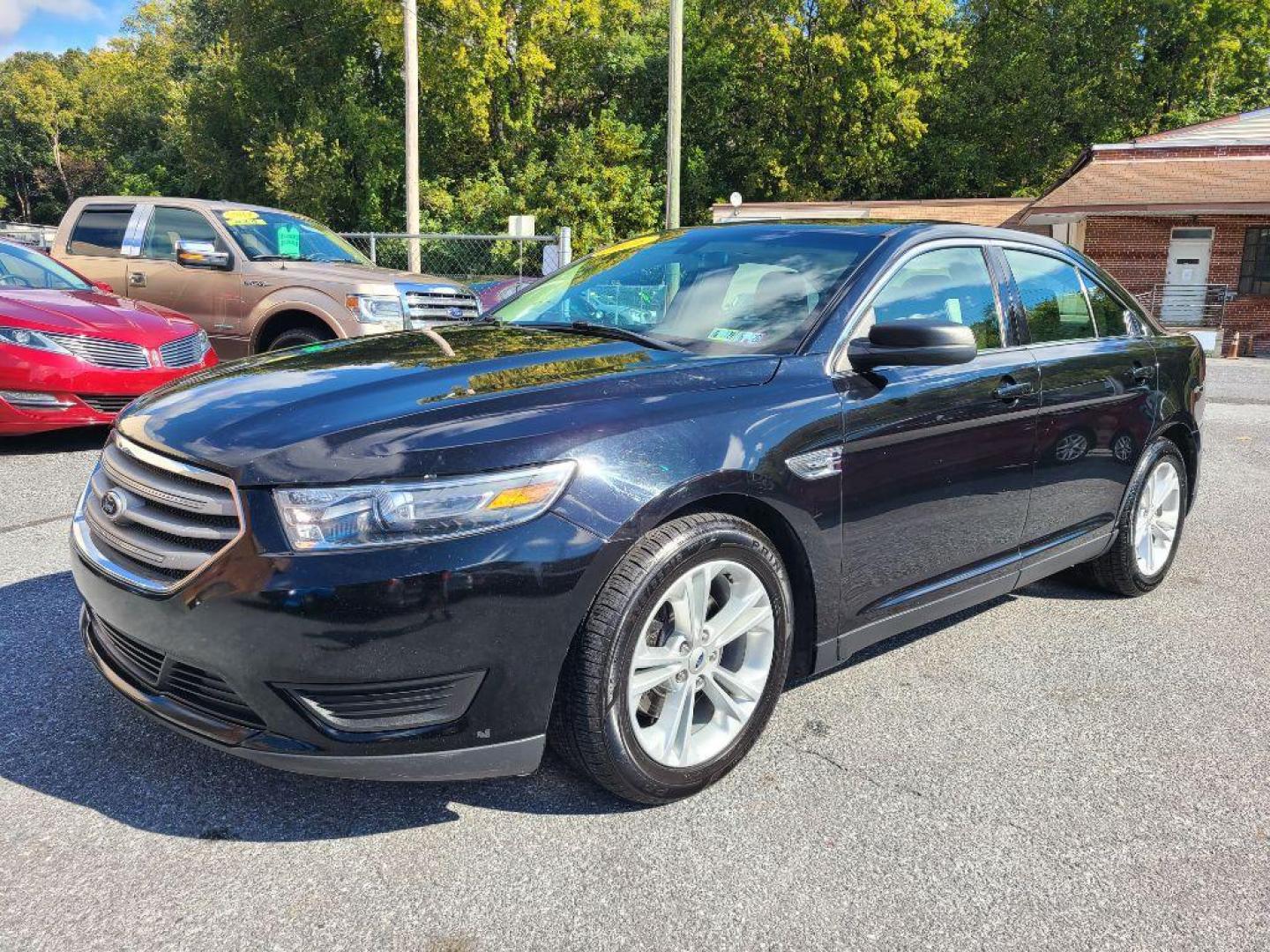 2016 BLACK FORD TAURUS SE (1FAHP2D8XGG) with an 3.5L engine, Automatic transmission, located at 117 North Cameron Street, Harrisburg, PA, 17101, (717) 963-8962, 40.266762, -76.875259 - WE FINANCE!!! Good Credit/ Bad Credit/ No Credit - ALL Trade-Ins Welcomed!!! ***Guaranteed Credit Approval*** APPLY ONLINE or CALL us TODAY ;) Please call us to discuss your cash and financing options. - Photo#0