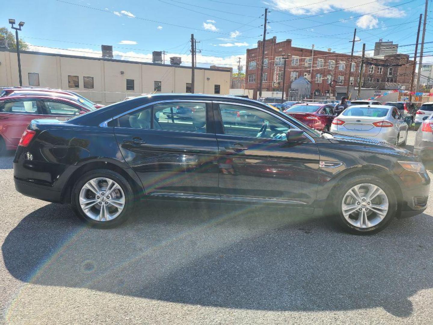 2016 BLACK FORD TAURUS SE (1FAHP2D8XGG) with an 3.5L engine, Automatic transmission, located at 117 North Cameron Street, Harrisburg, PA, 17101, (717) 963-8962, 40.266762, -76.875259 - WE FINANCE!!! Good Credit/ Bad Credit/ No Credit - ALL Trade-Ins Welcomed!!! ***Guaranteed Credit Approval*** APPLY ONLINE or CALL us TODAY ;) Please call us to discuss your cash and financing options. - Photo#6