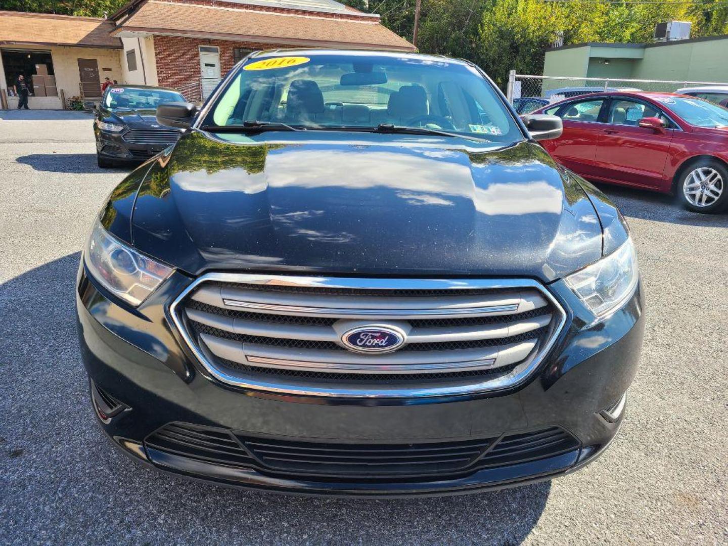 2016 BLACK FORD TAURUS SE (1FAHP2D8XGG) with an 3.5L engine, Automatic transmission, located at 117 North Cameron Street, Harrisburg, PA, 17101, (717) 963-8962, 40.266762, -76.875259 - WE FINANCE!!! Good Credit/ Bad Credit/ No Credit - ALL Trade-Ins Welcomed!!! ***Guaranteed Credit Approval*** APPLY ONLINE or CALL us TODAY ;) Please call us to discuss your cash and financing options. - Photo#8
